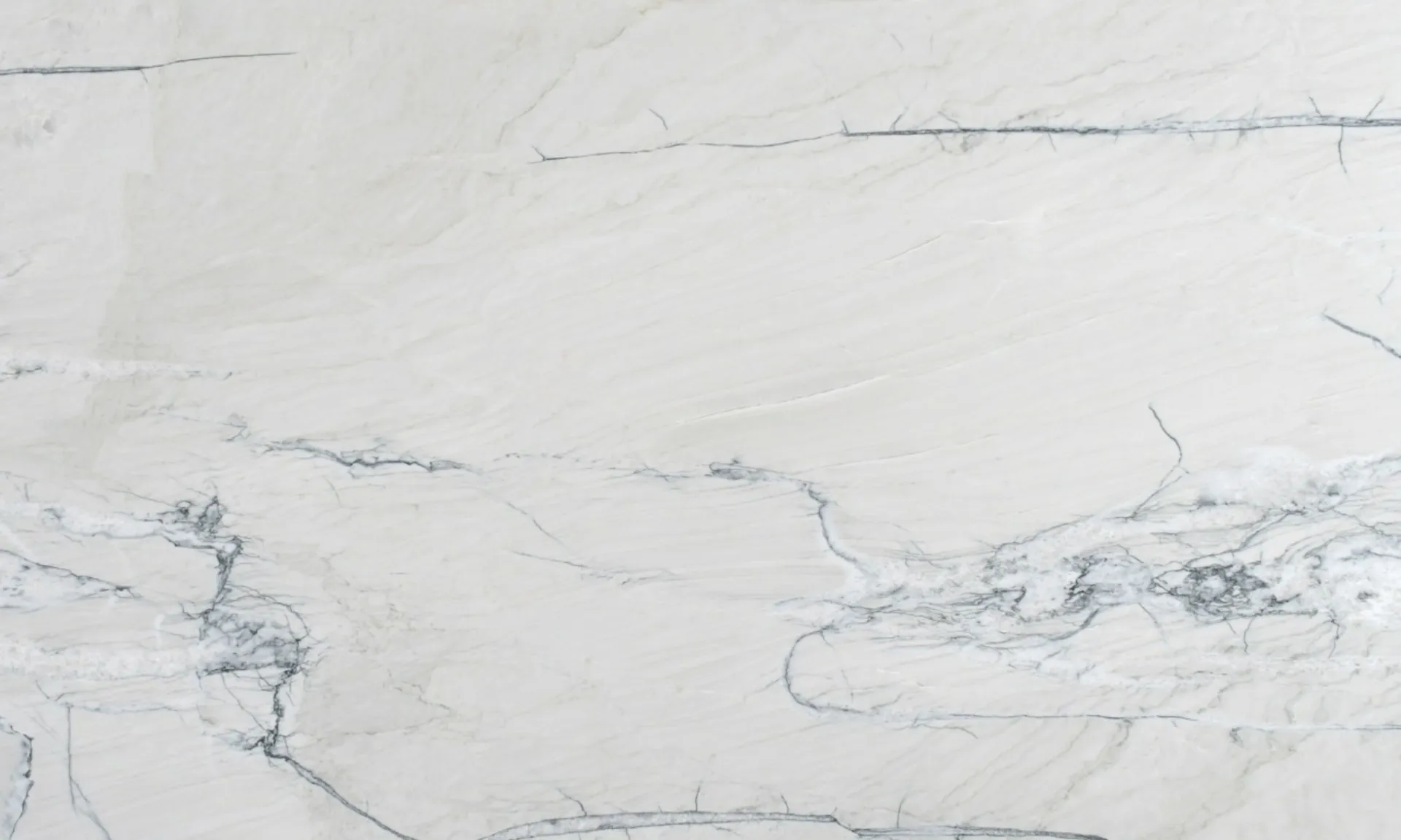 Closeup image of Fantasy Lux Quartzite 1st Choice White Quartzite countertop slab
