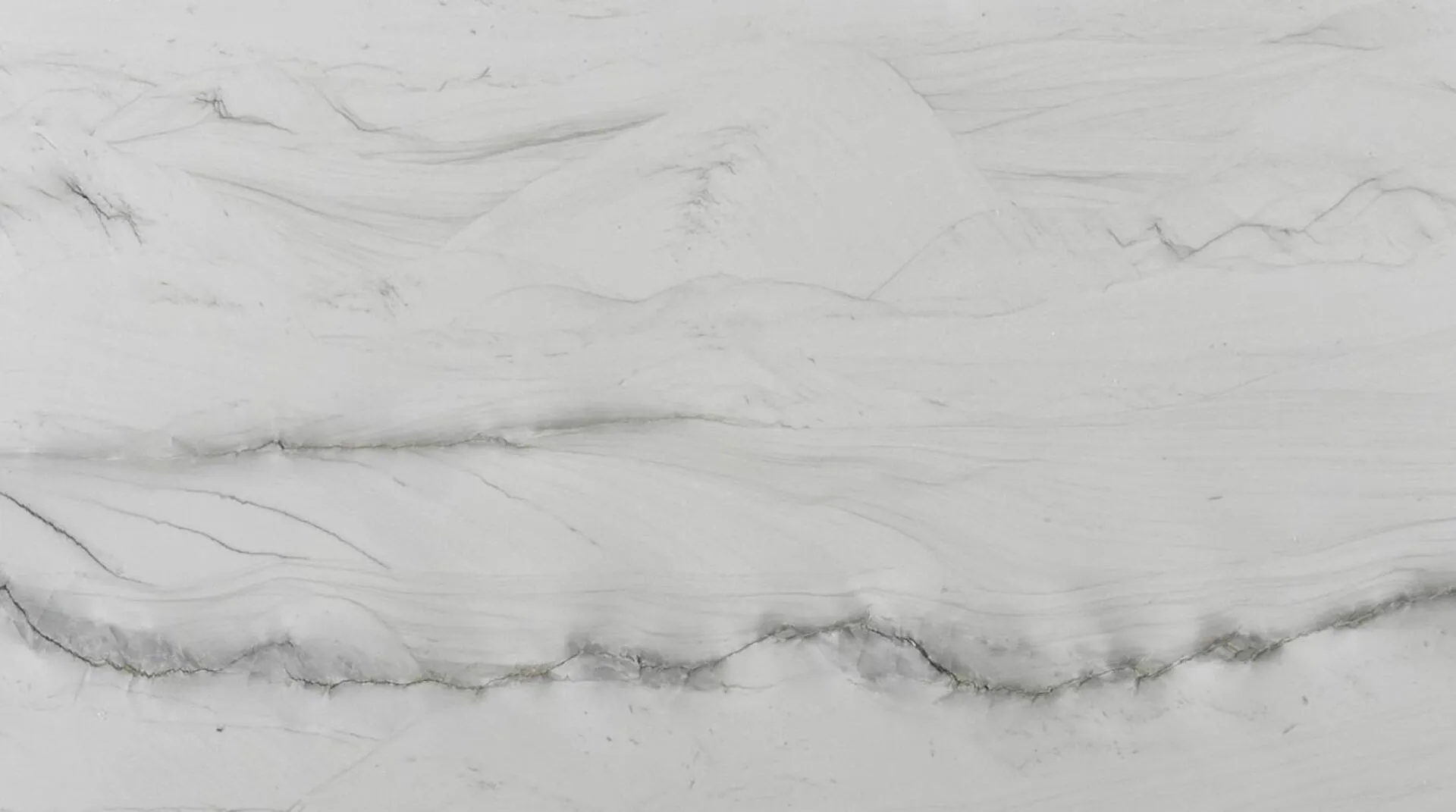 Closeup image of Luce Di Luna White Quartzite countertop slab