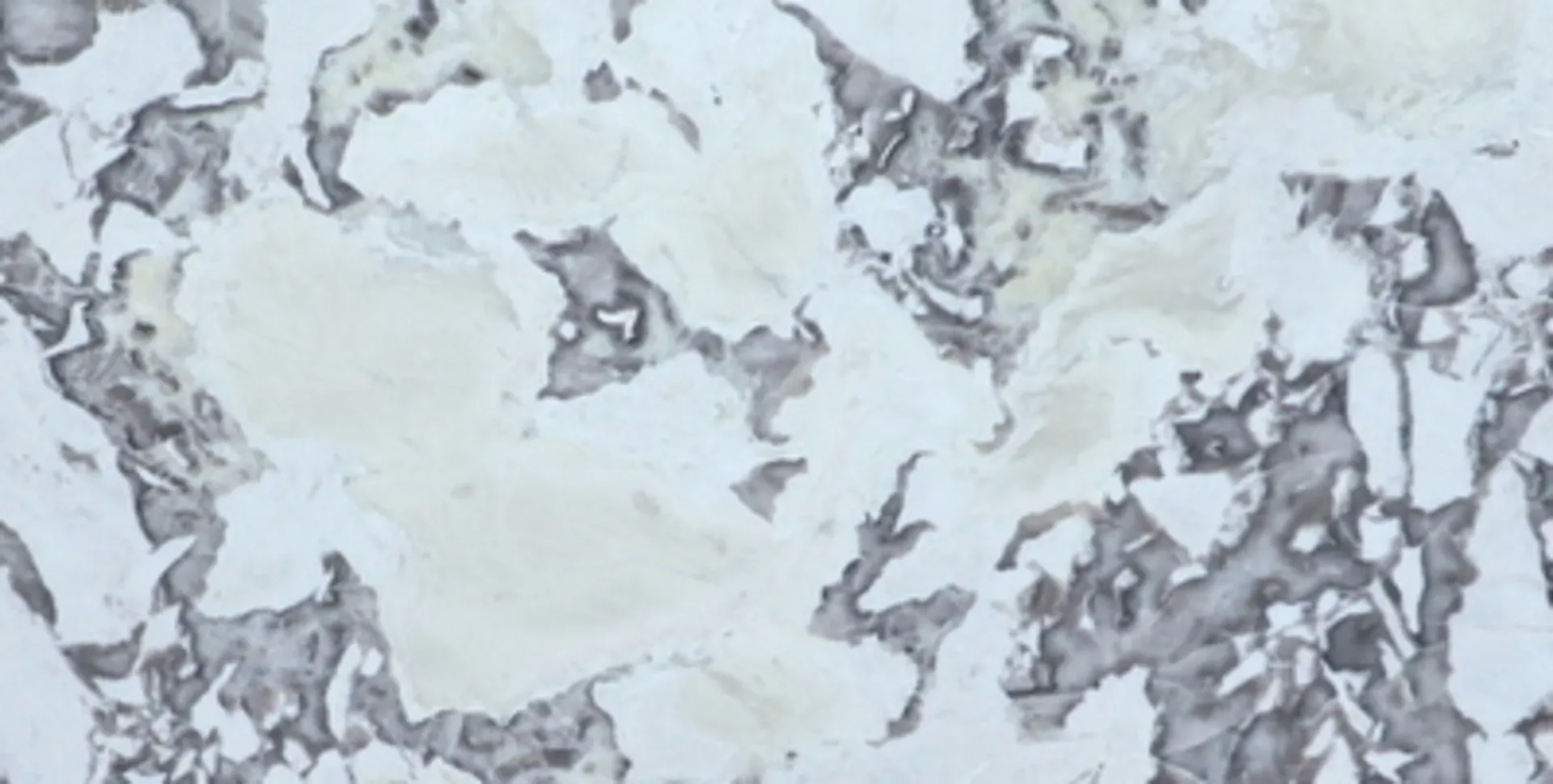 Closeup image of Oyster White 1st Choice Cream Marble countertop slab