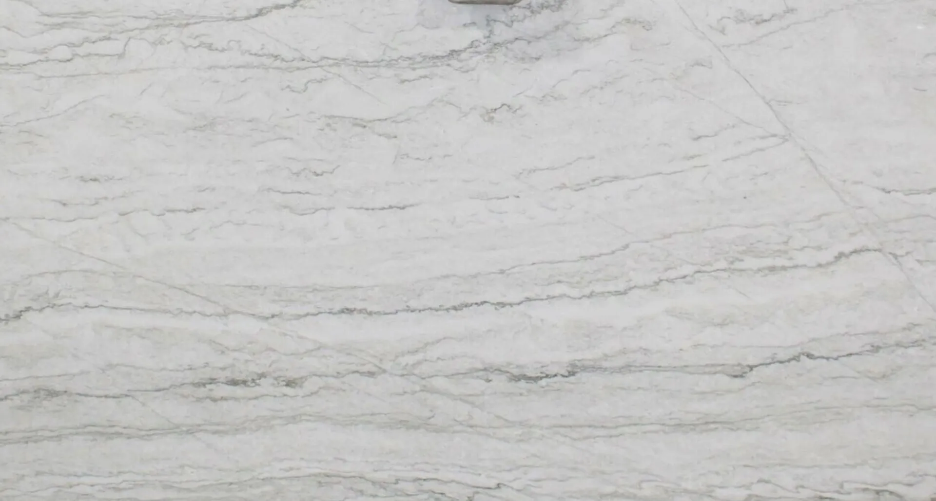 Closeup image of Sea Pearl 1st Choice Grey Quartzite countertop slab