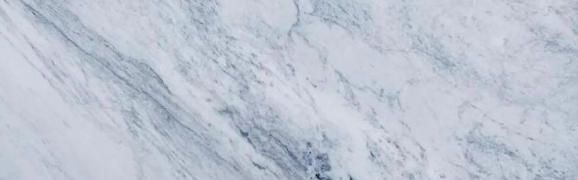 Closeup image of Shadow Storm 1st Choice White Marble countertop slab