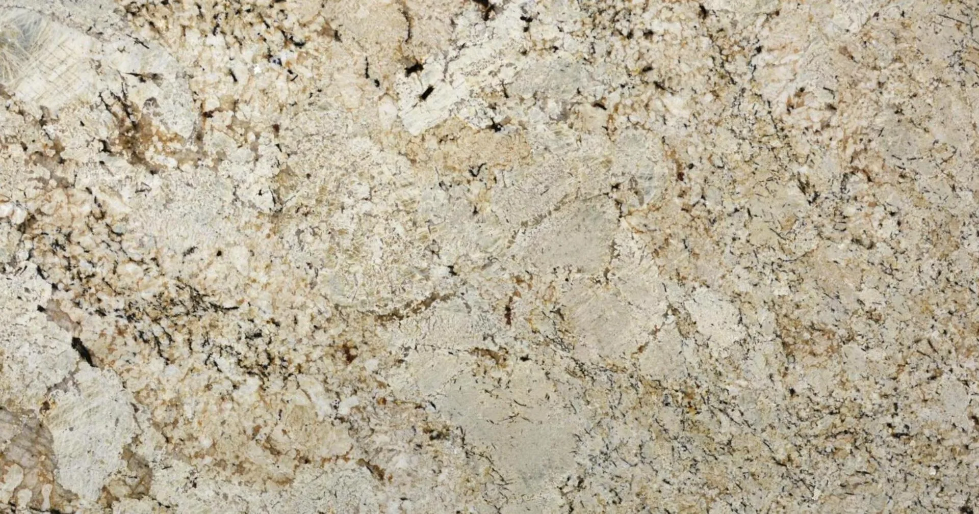 Closeup image of Snow Fall 1st Choice Beige Granite countertop slab