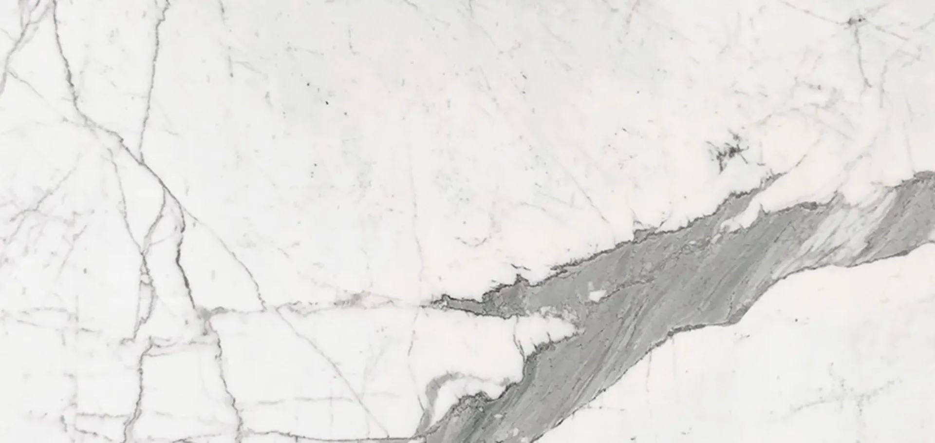 Closeup image of Statuario Extra White Marble countertop slab