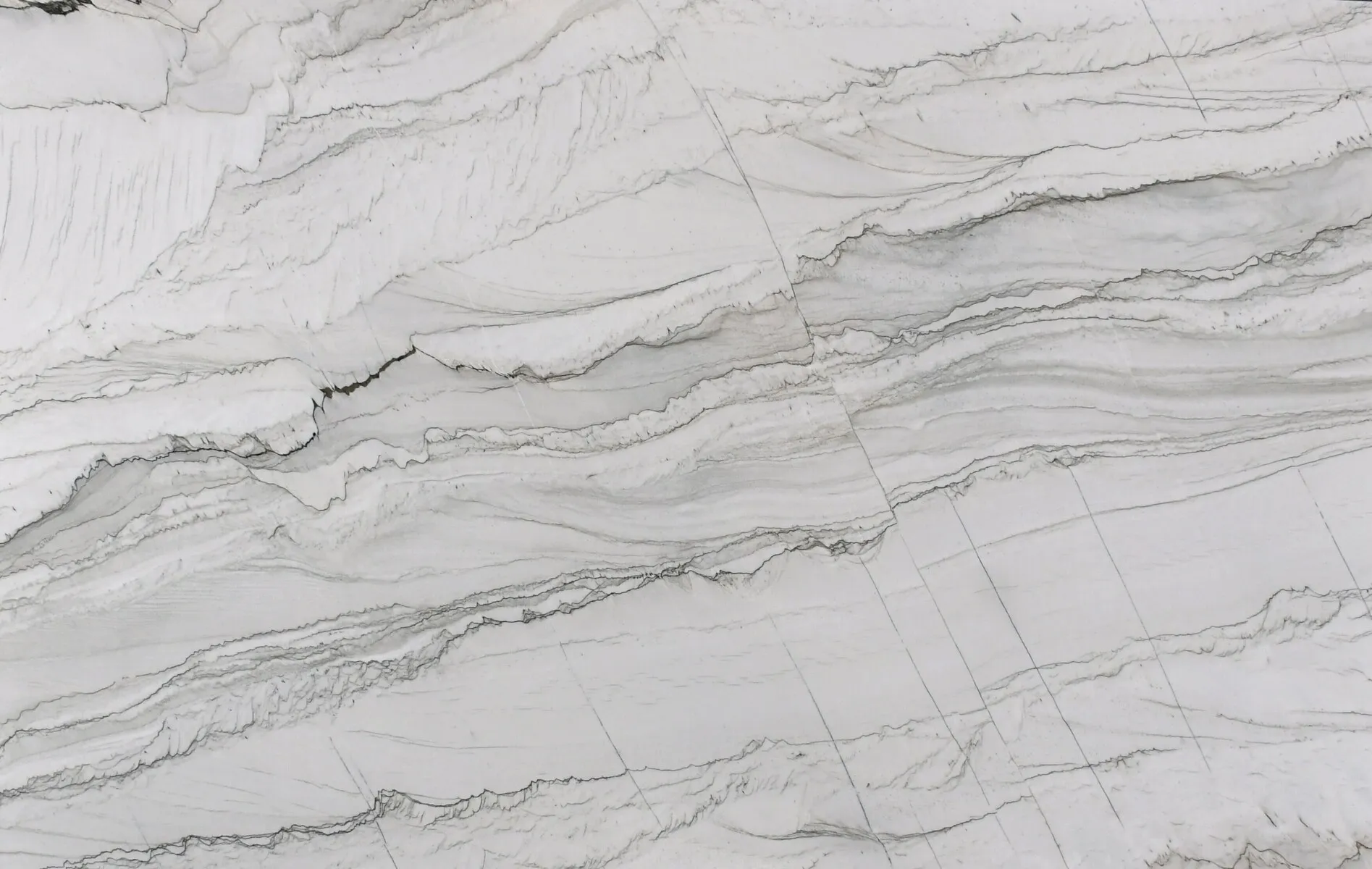 Closeup image of Statuario Quartzite White Quartzite countertop slab