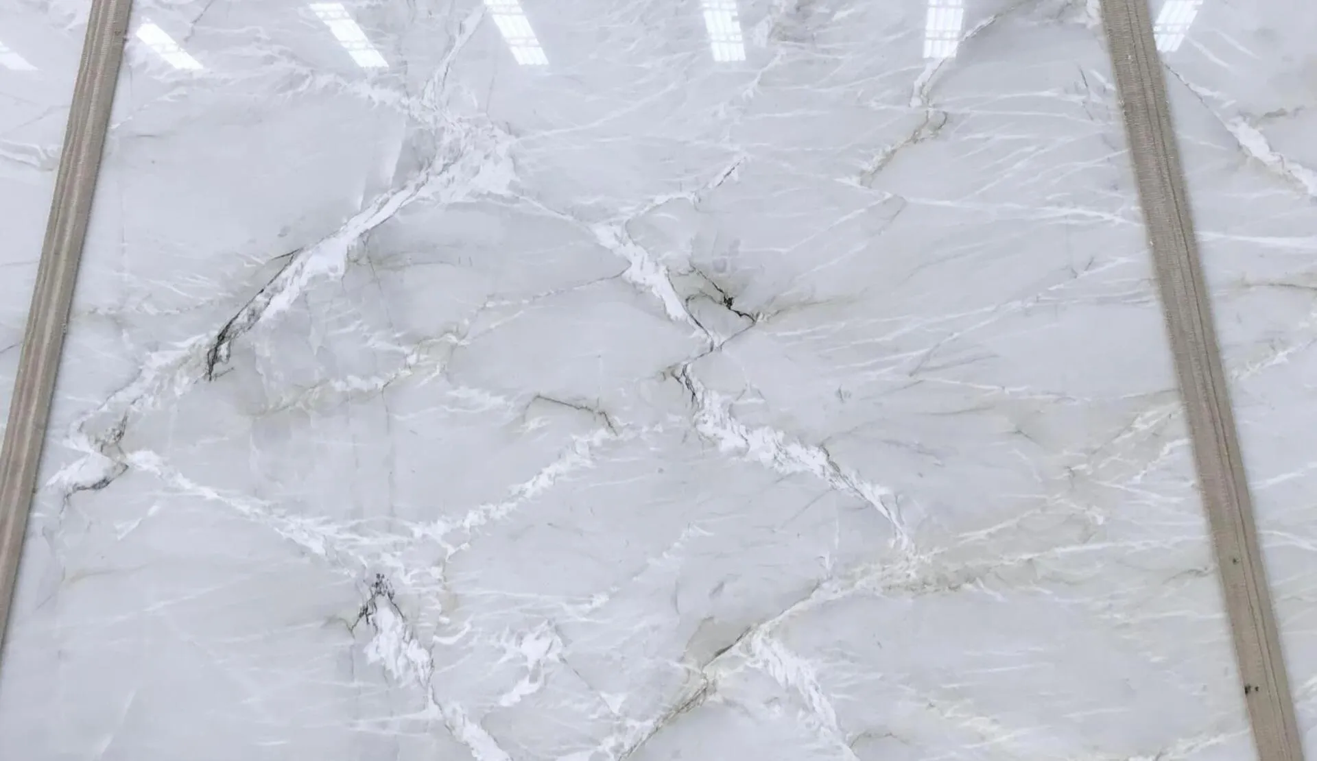 Closeup image of Swan Quartzite White Quartzite countertop slab