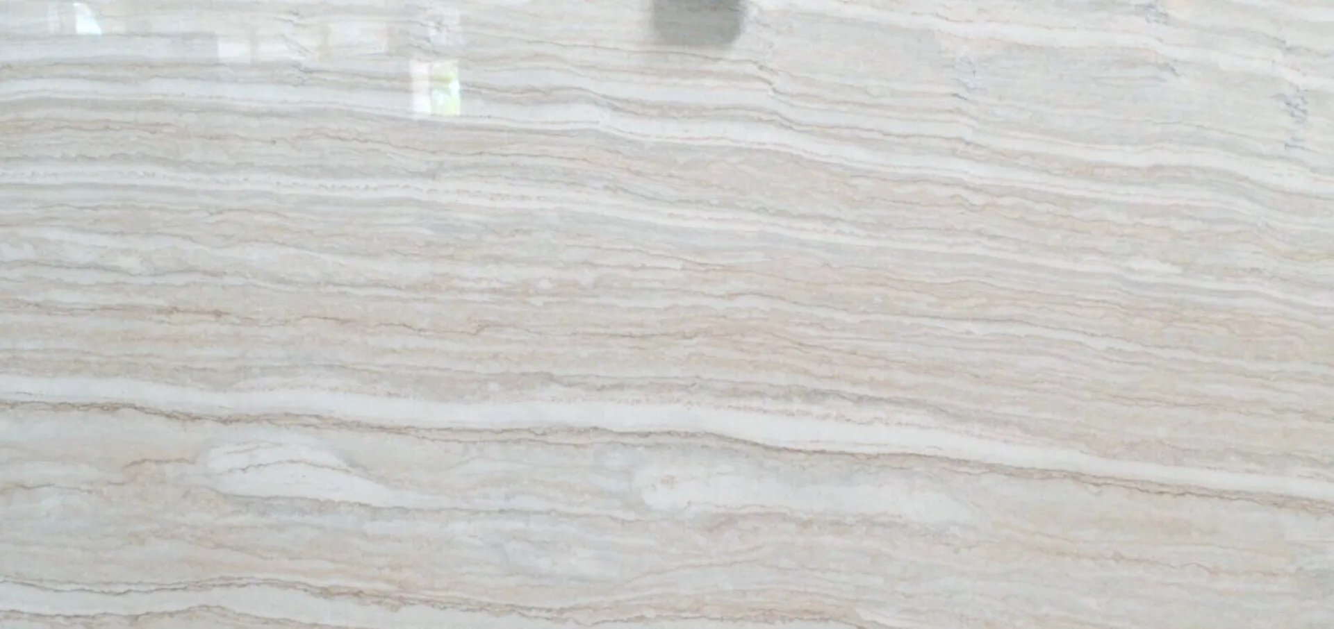 Closeup image of Travertino Quartzite 1st Choice Cream Quartzite countertop slab