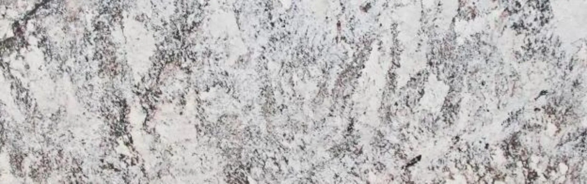 Closeup image of White Nile White Granite countertop slab