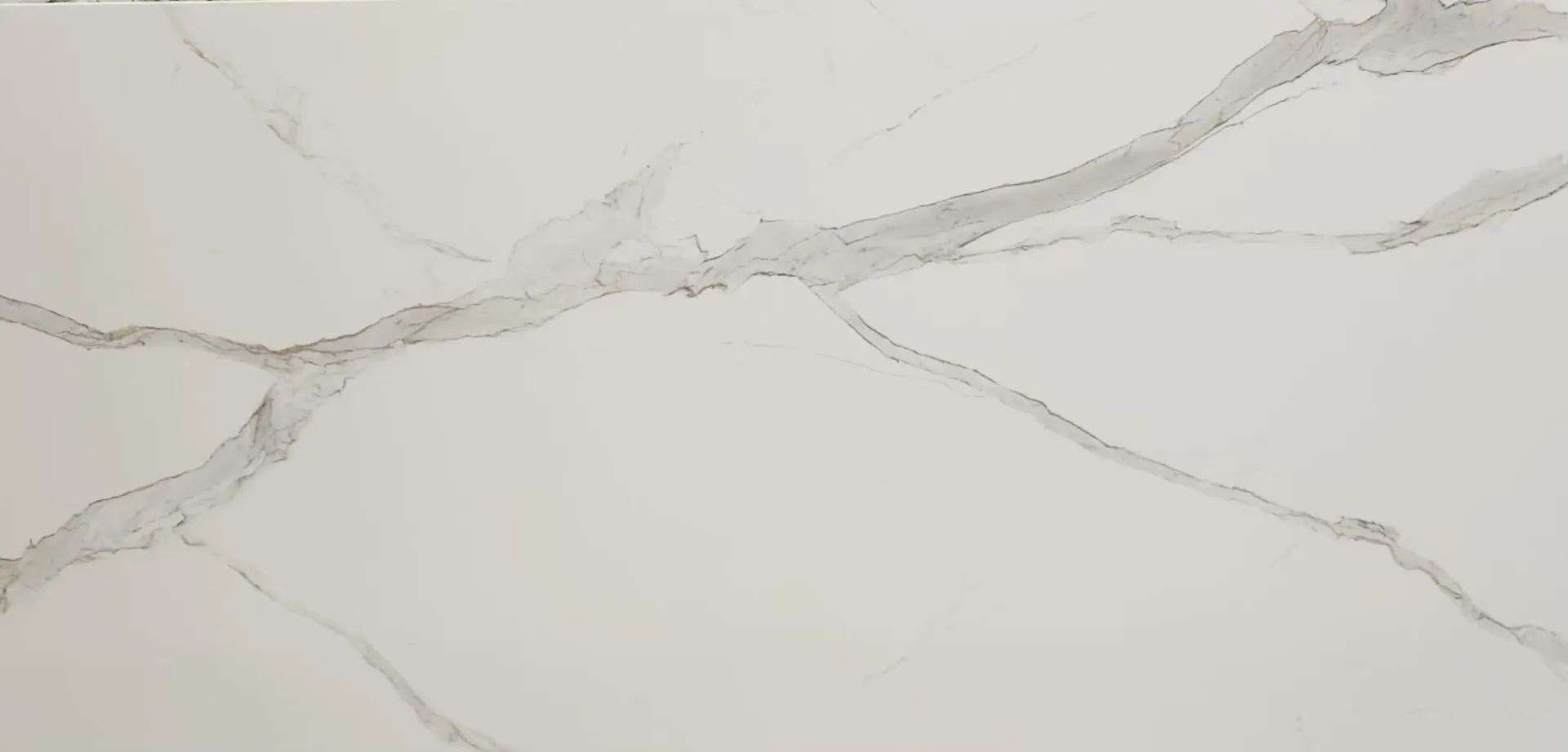 Closeup image of Opal Surfaces Statuario Raffaello White Porcelain countertop slab