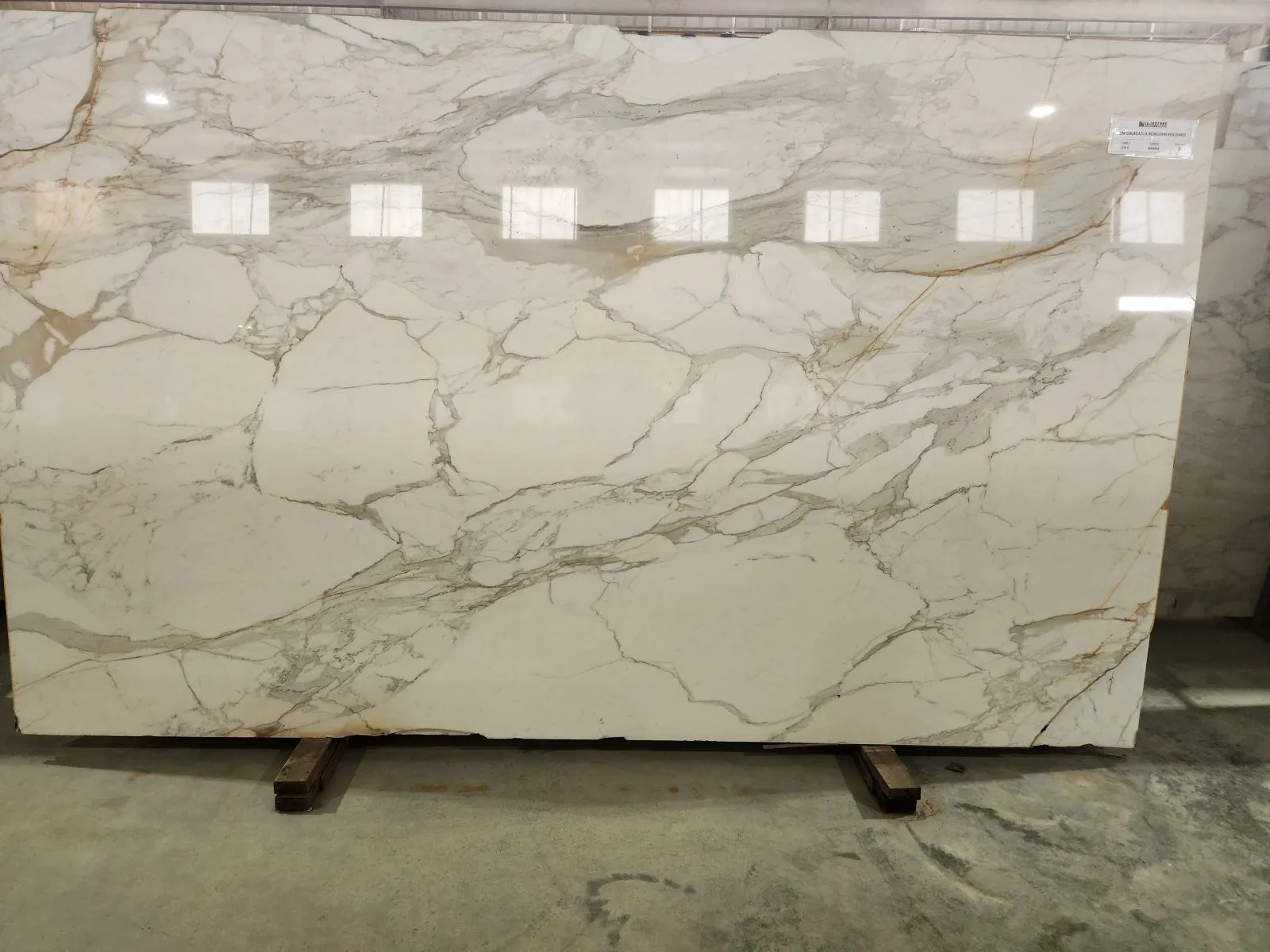 Closeup image of Calacatta Borghini Cream Marble countertop slab
