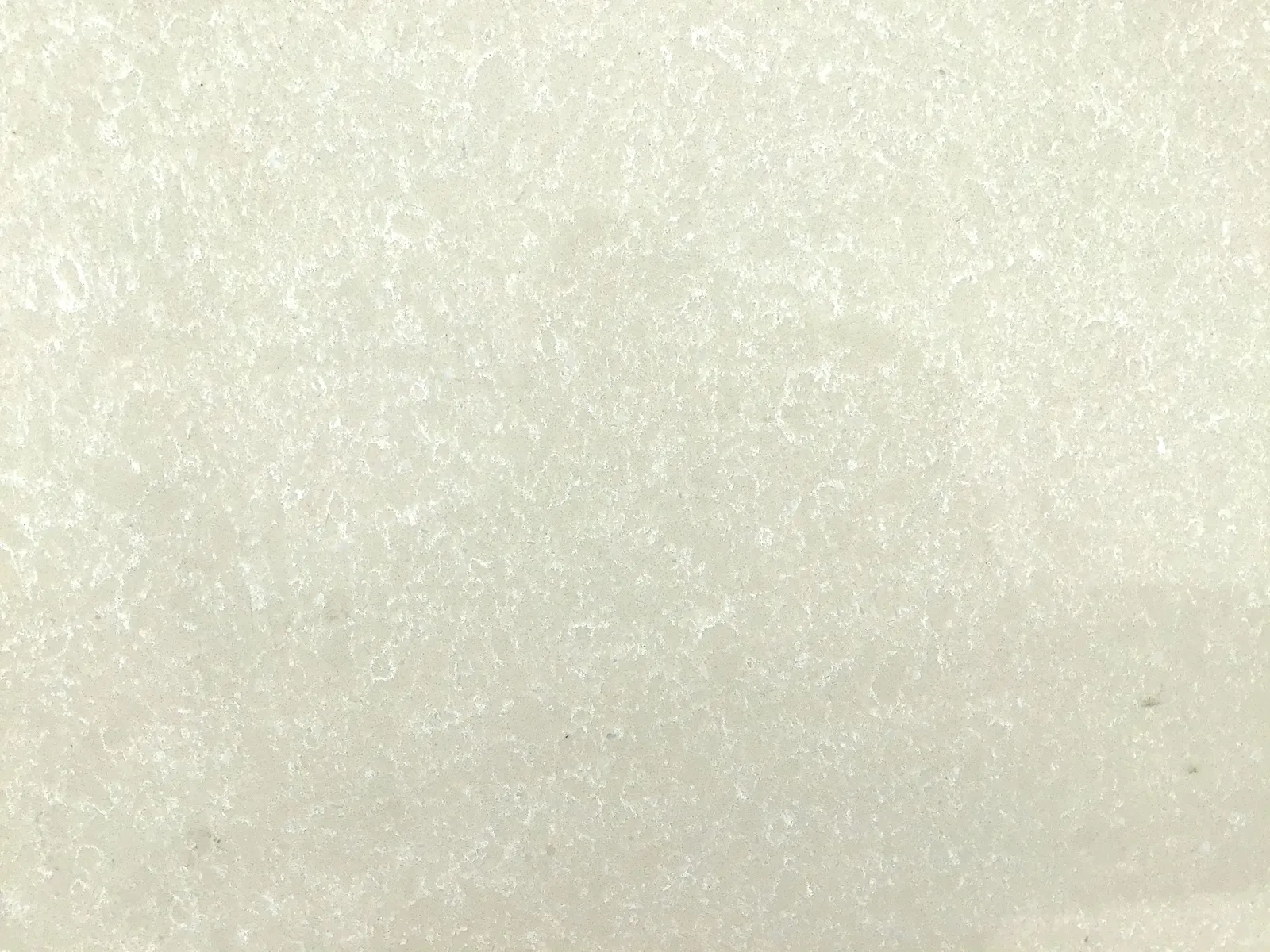 Closeup image of Opal Quartz Crema Marfil Cream Quartz countertop slab