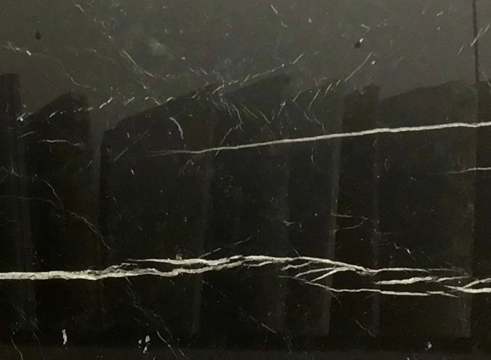 Closeup image of Nero Marquina Black Marble countertop slab