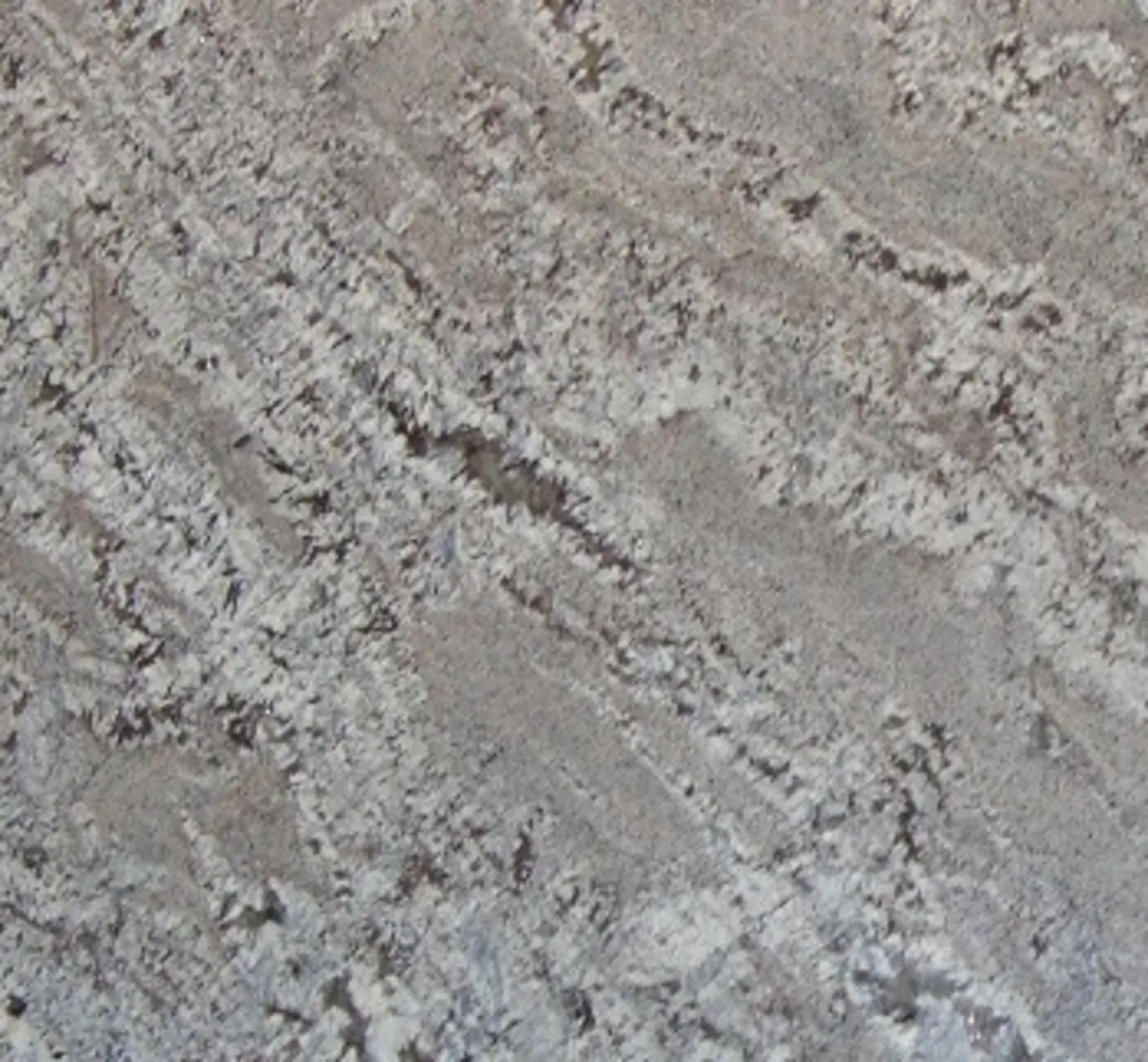 Closeup image of Azul Delicato Grey Granite countertop slab