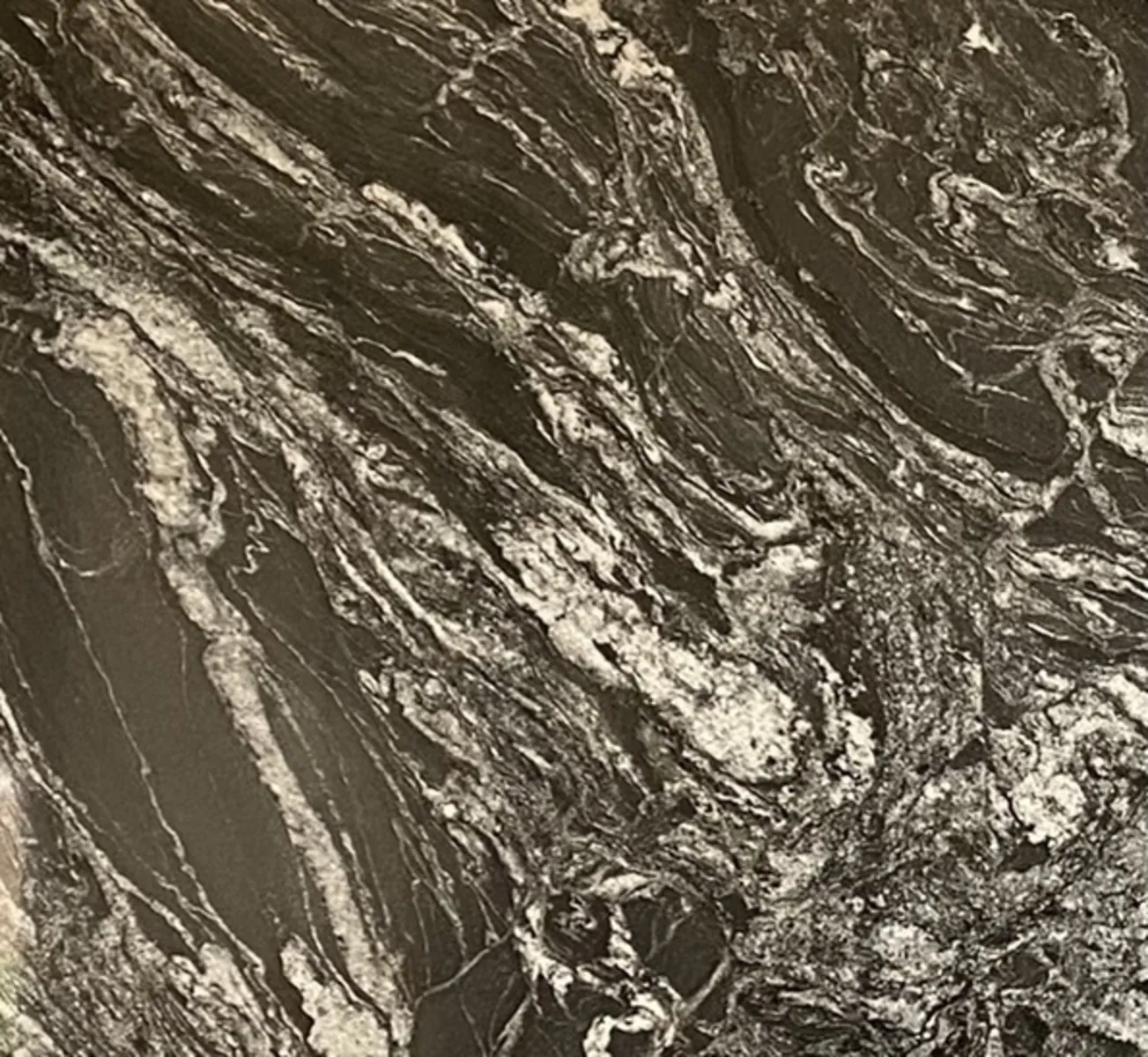 Closeup image of Black Forest Black Granite countertop slab