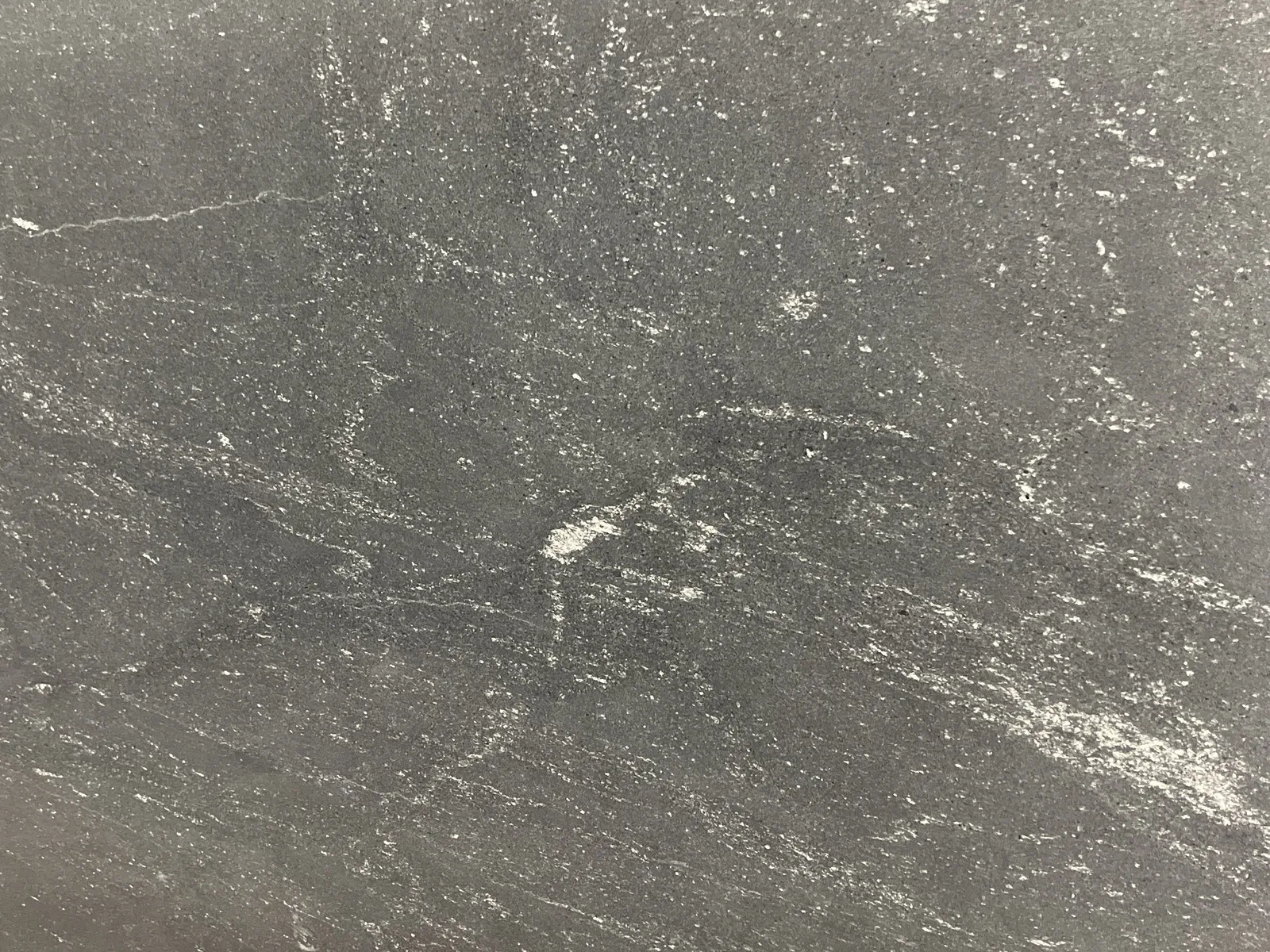 Closeup image of Black Mist Grey Granite countertop slab
