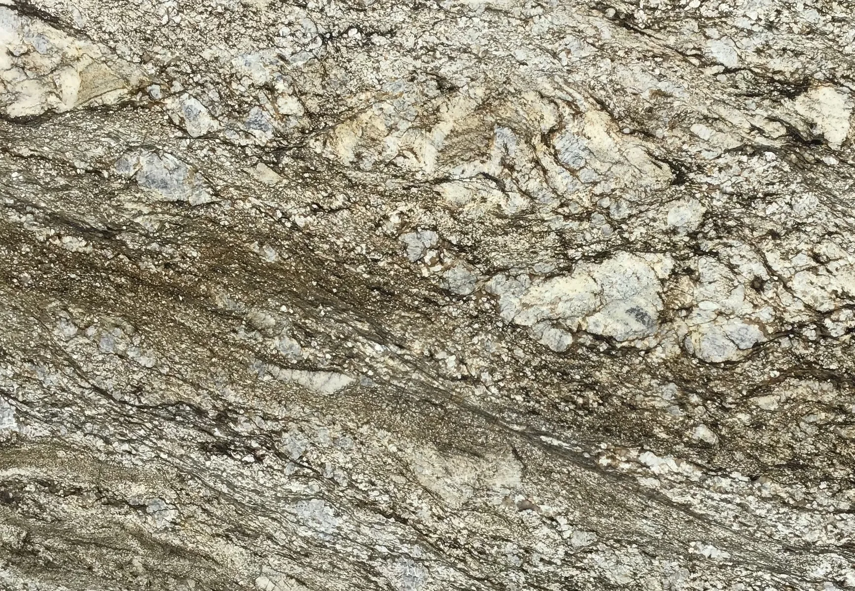 Closeup image of Blue Dunes Brown Granite countertop slab
