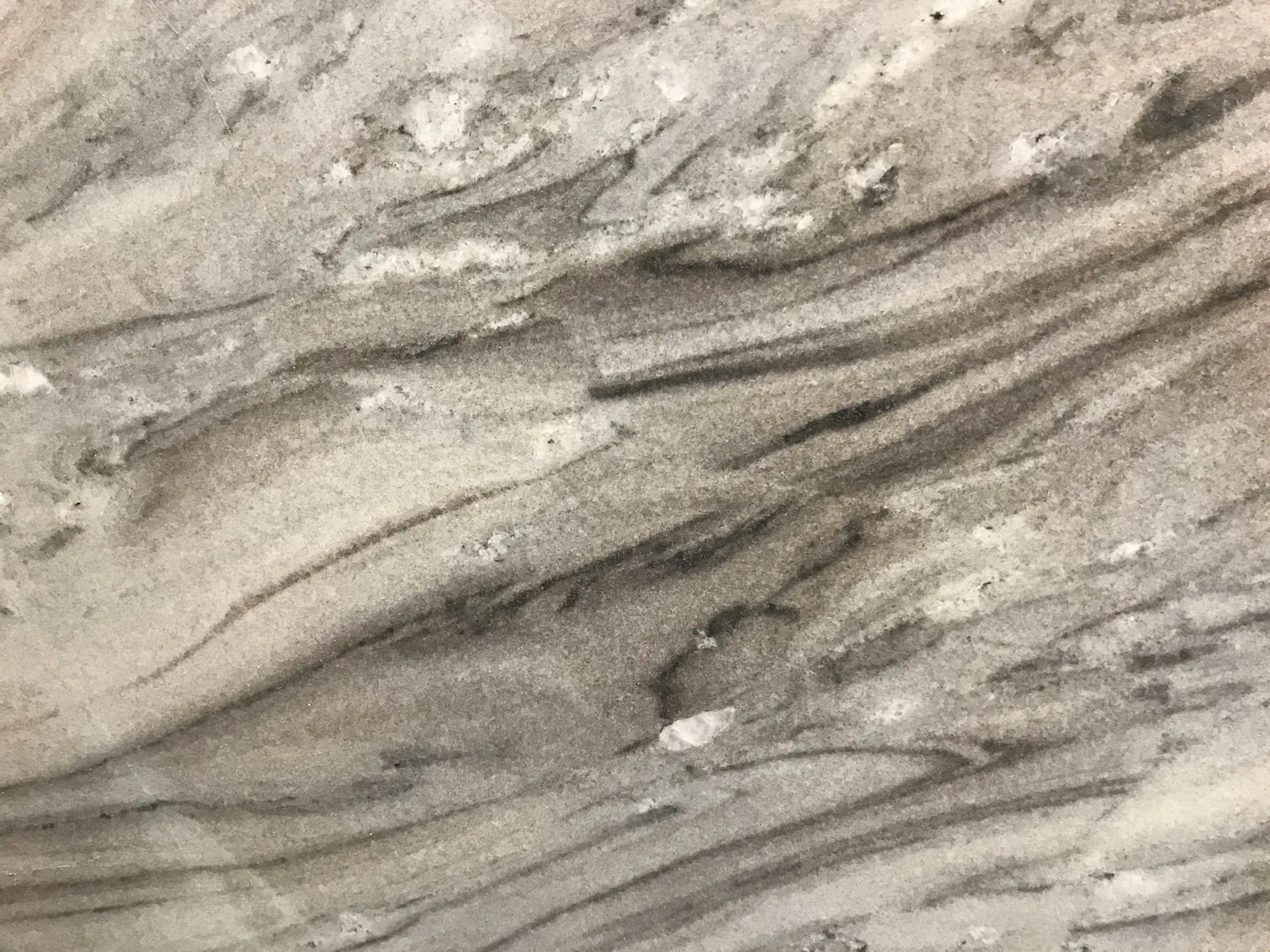 Closeup image of Bruno White Grey Marble countertop slab
