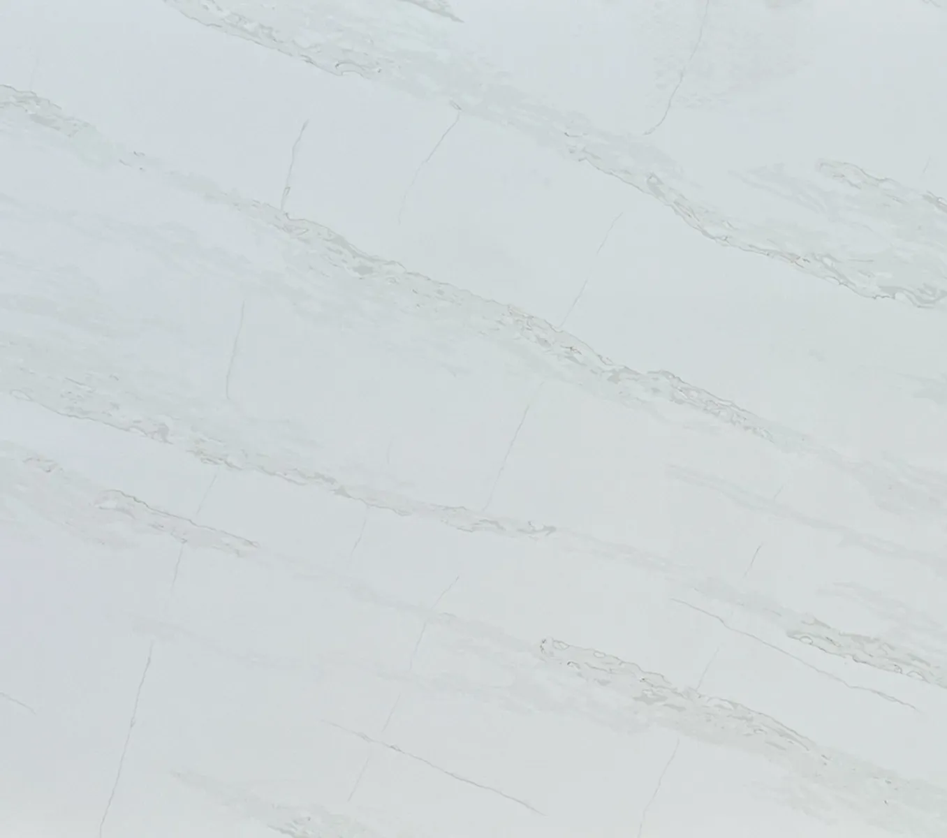 Closeup image of Opal Quartz Calacatta Greek White Quartz countertop slab