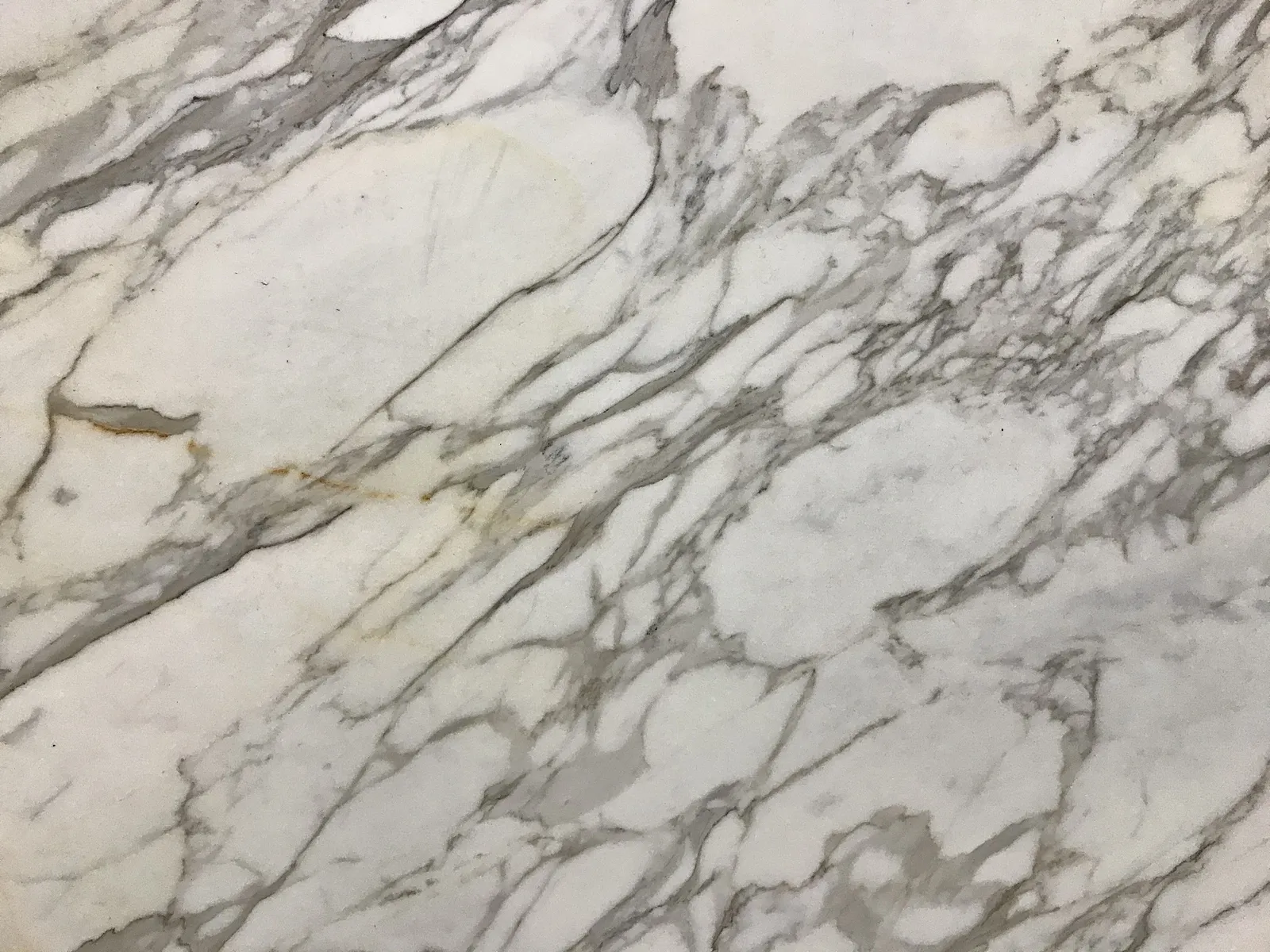 Closeup image of Calacatta White Marble countertop slab