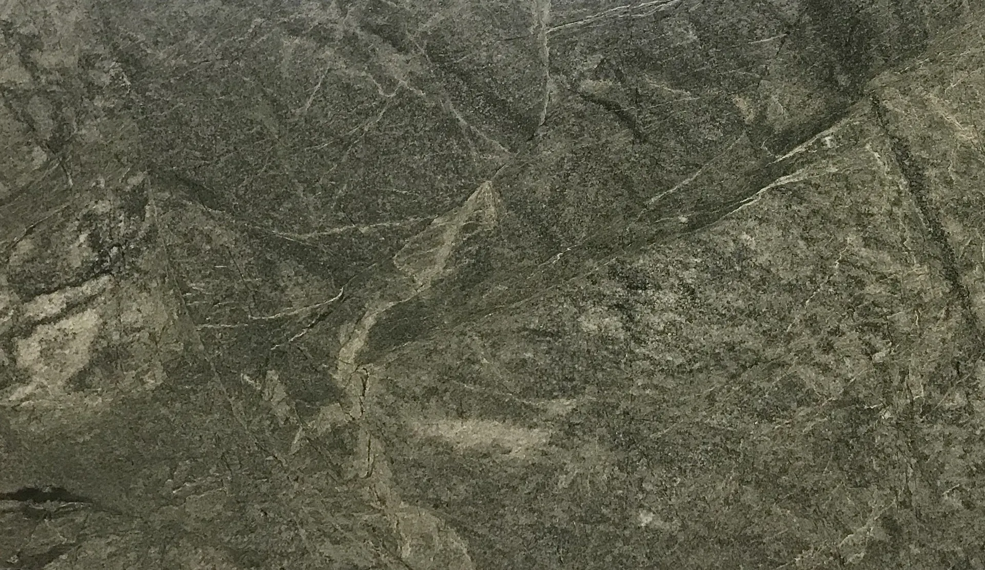 Closeup image of Costa Esmeralda Green Granite countertop slab