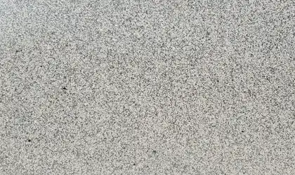 Closeup image of Crema Carmel Grey Granite countertop slab Stone Countertop