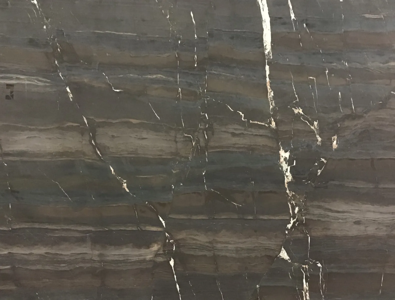 Closeup image of Duetto Velvet Finish Brown Quartzite countertop slab
