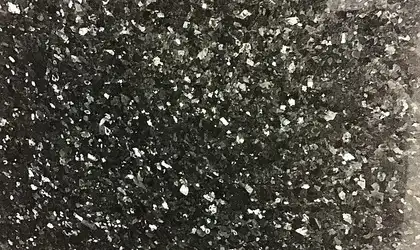 Closeup image of Emerald Pearl Black Granite countertop slab