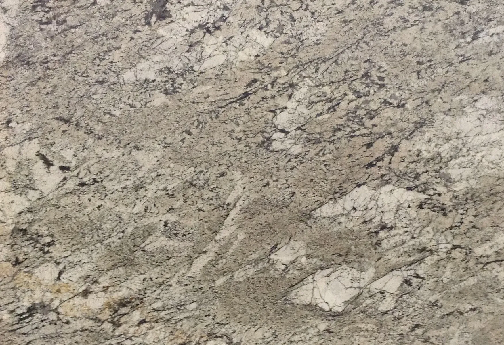Closeup image of Fantacy White Beige Granite countertop slab