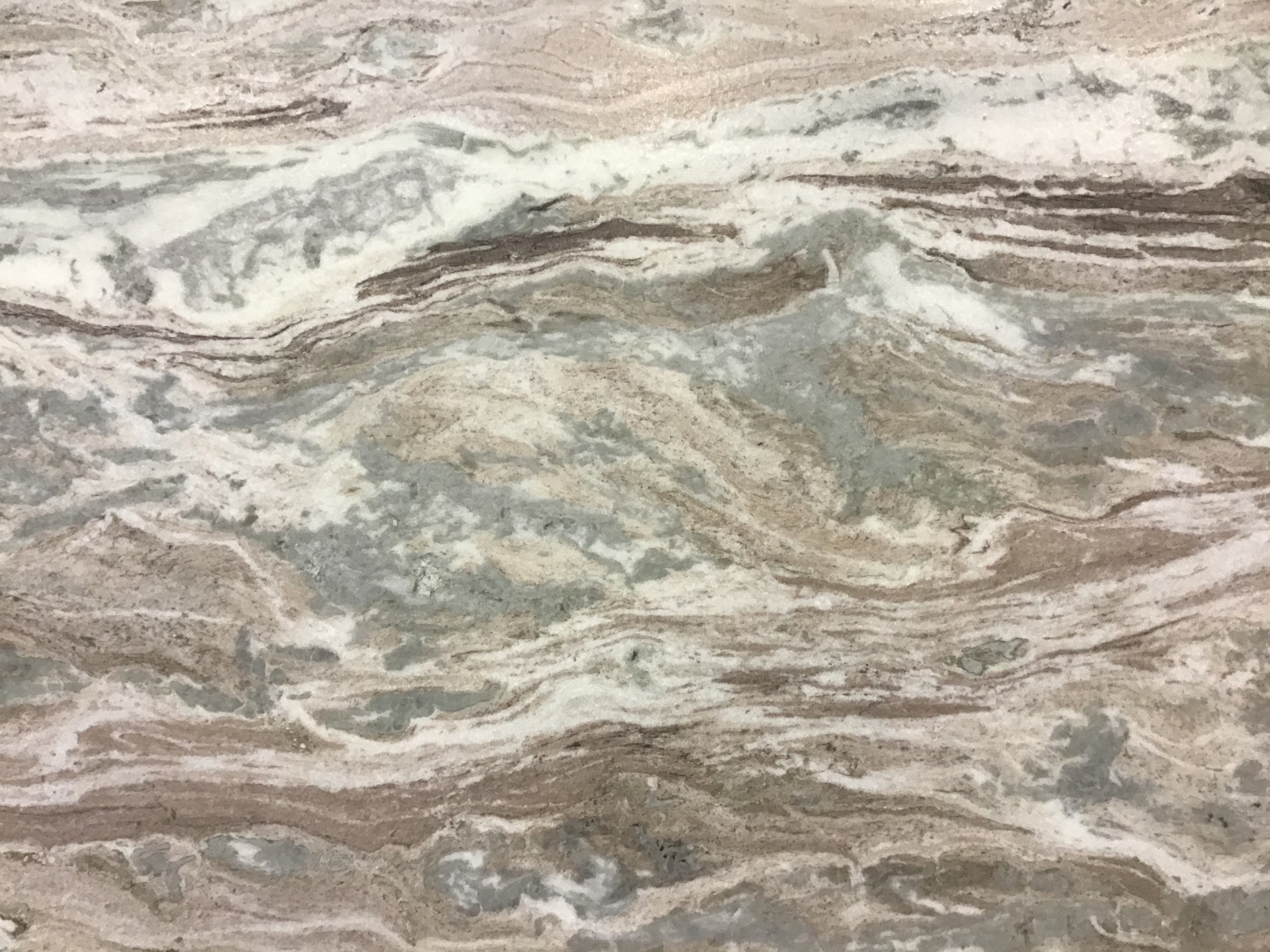 Closeup image of Fantasy Brown Grey Marble countertop slab
