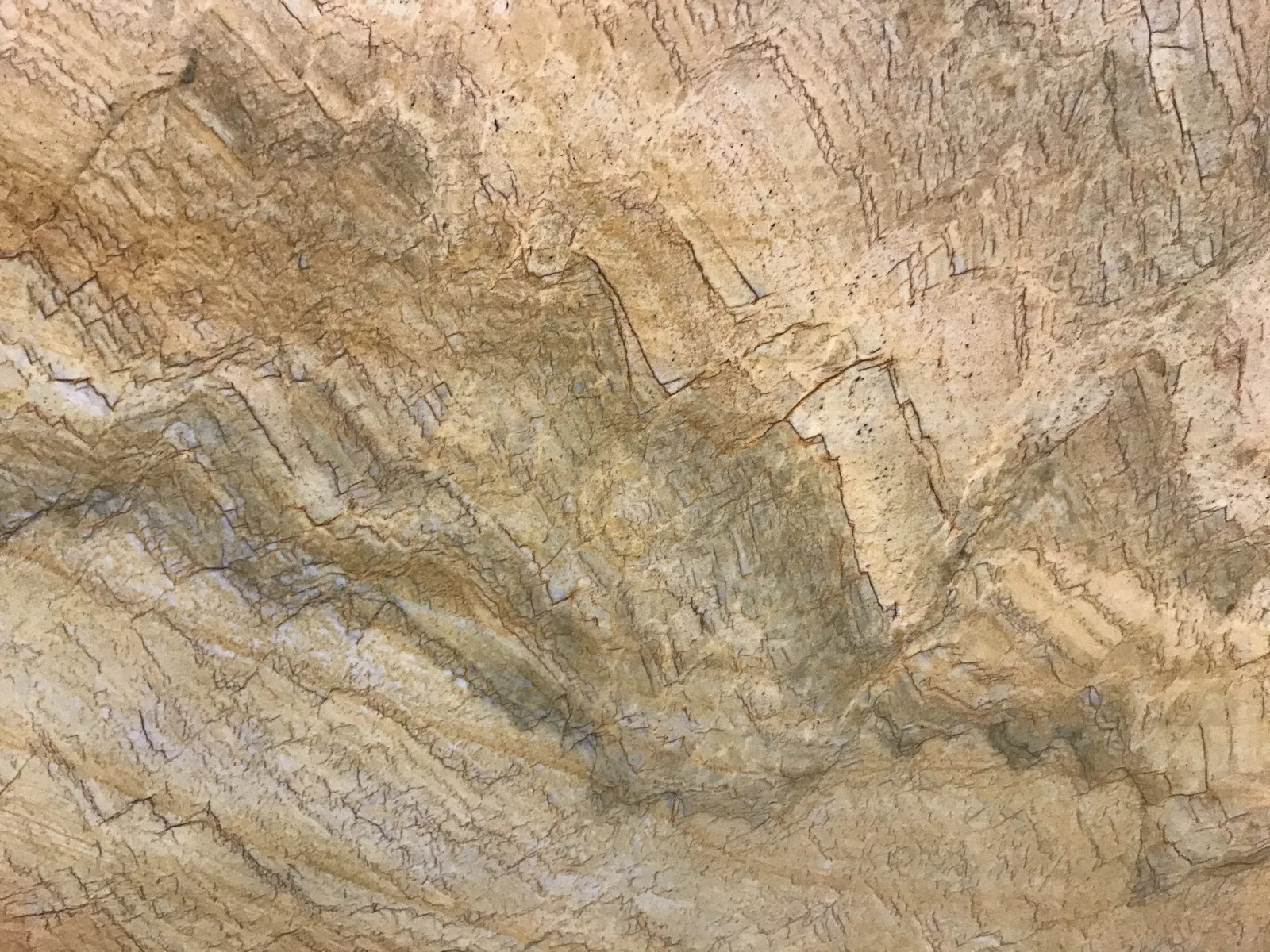 Closeup image of Gold Macaubas Beige Quartzite countertop slab