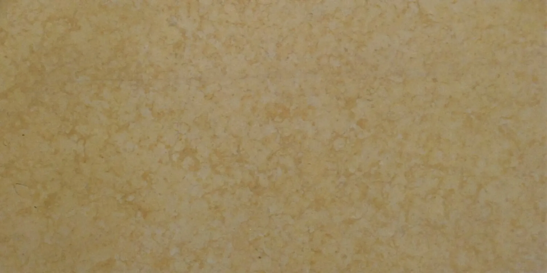 Closeup image of J Gold Beige Limestone countertop slab