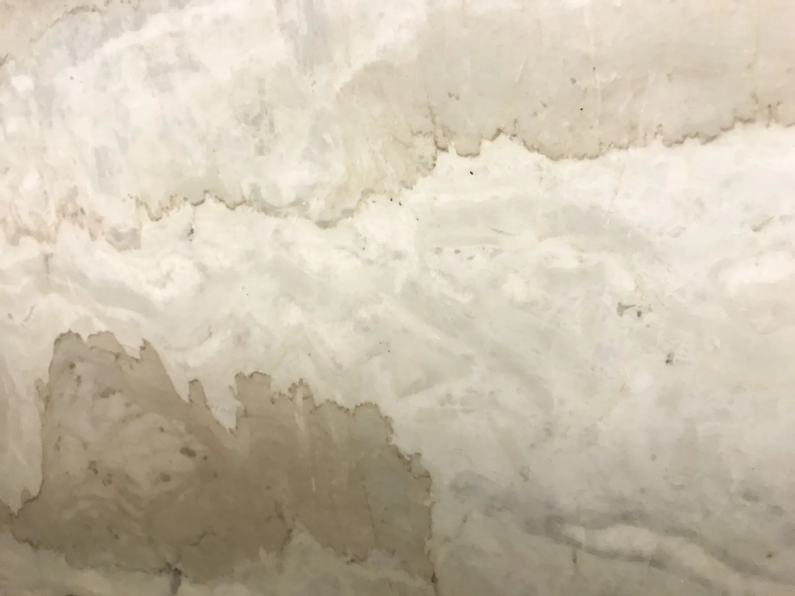 Closeup image of La Dolce Vita Cream Quartzite countertop slab
