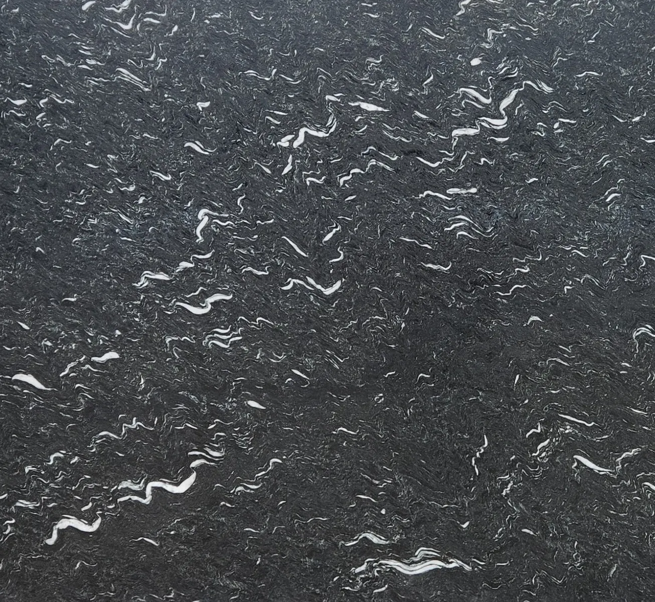 Closeup image of Laguna Black Finish Black Granite countertop slab