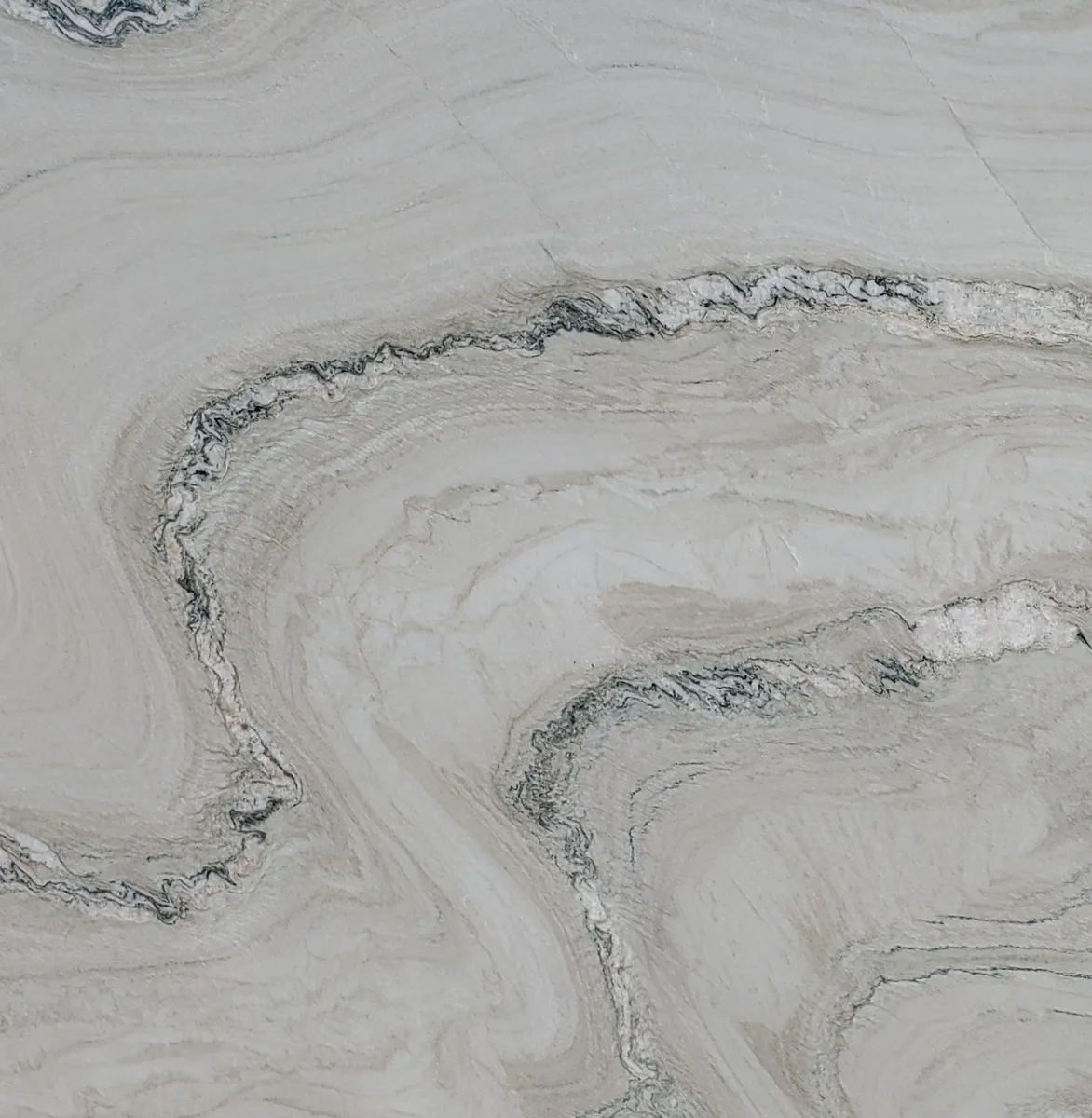 Closeup image of Macaubas Fantasy Grey Quartzite countertop slab