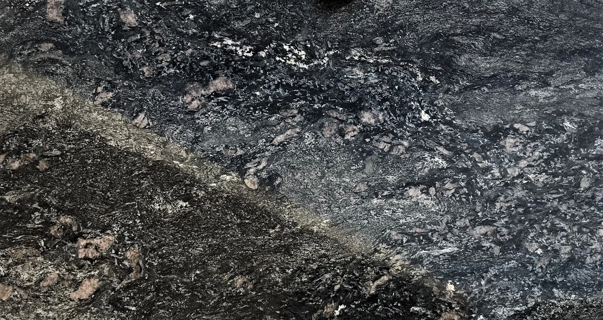 Closeup image of Mary Blue Black Granite countertop slab