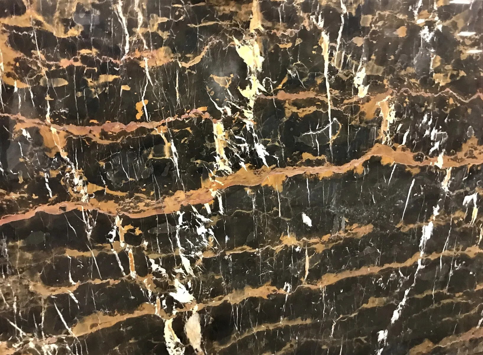 Closeup image of Michael Angelo Black Marble countertop slab