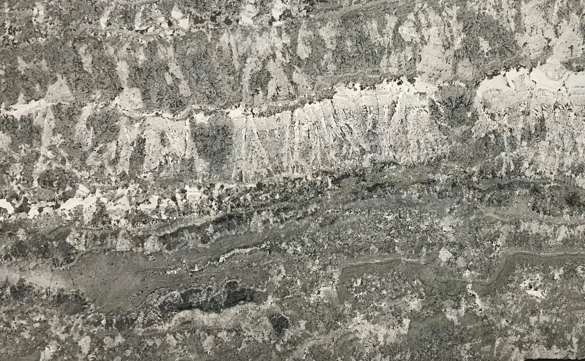 Closeup image of Minsk Grey Granite countertop slab