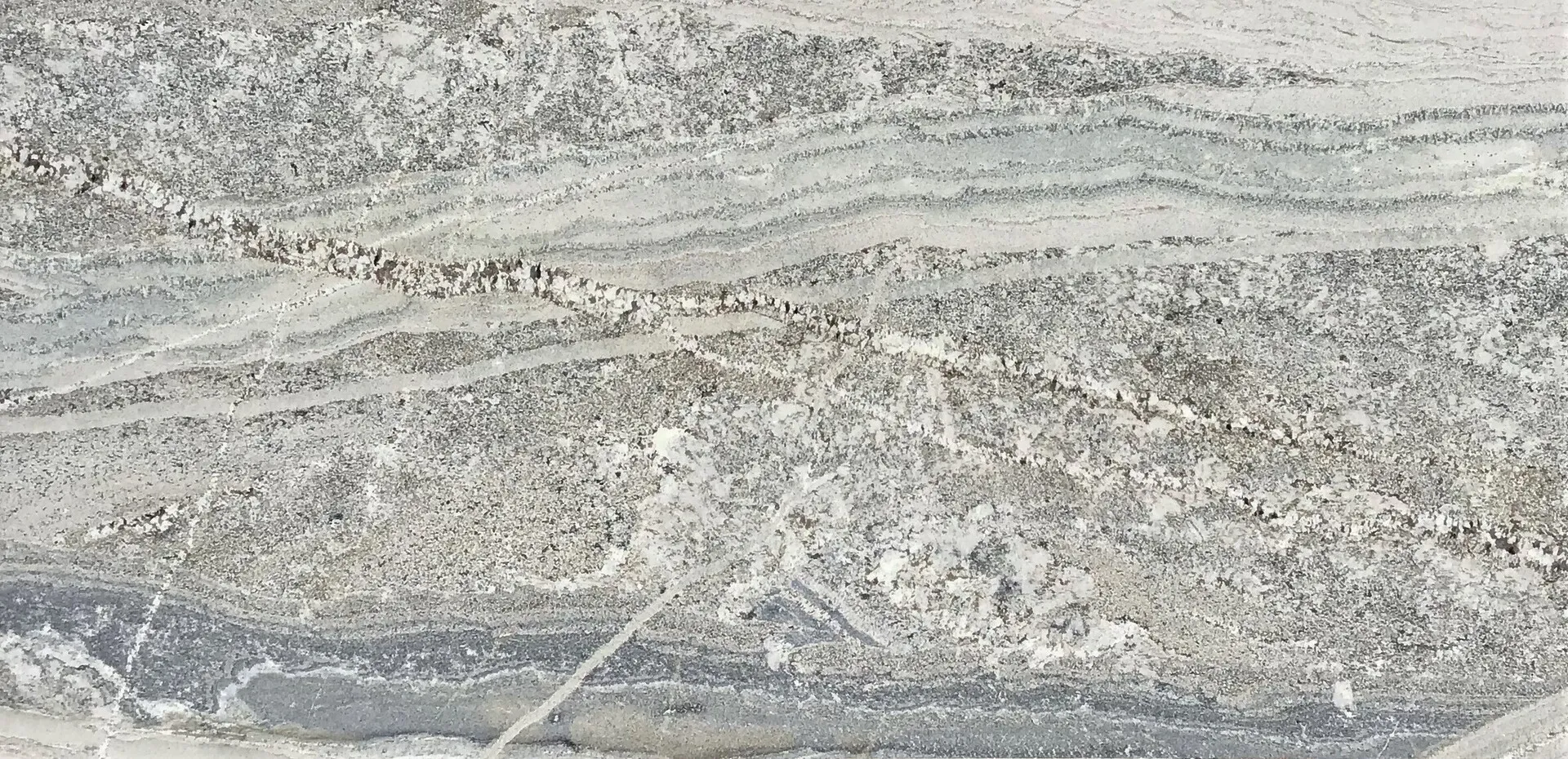 Closeup image of Monte Cristo Grey Granite countertop slab