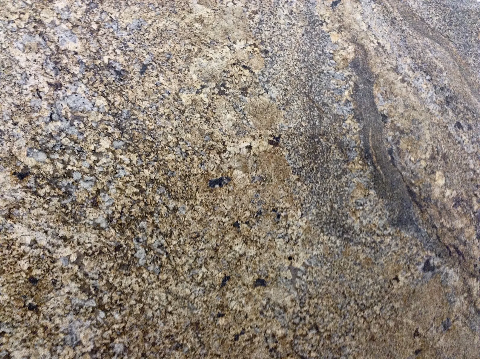 Closeup image of Namibian Brown Brown Granite countertop slab