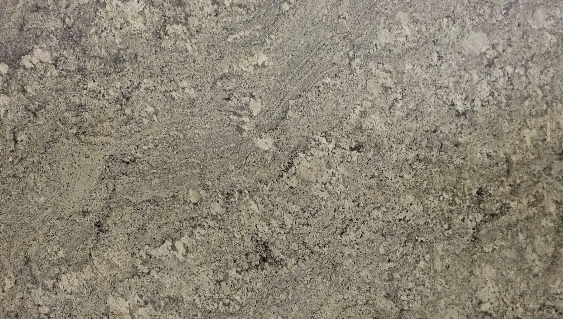Closeup image of Namibian Dream Grey Granite countertop slab