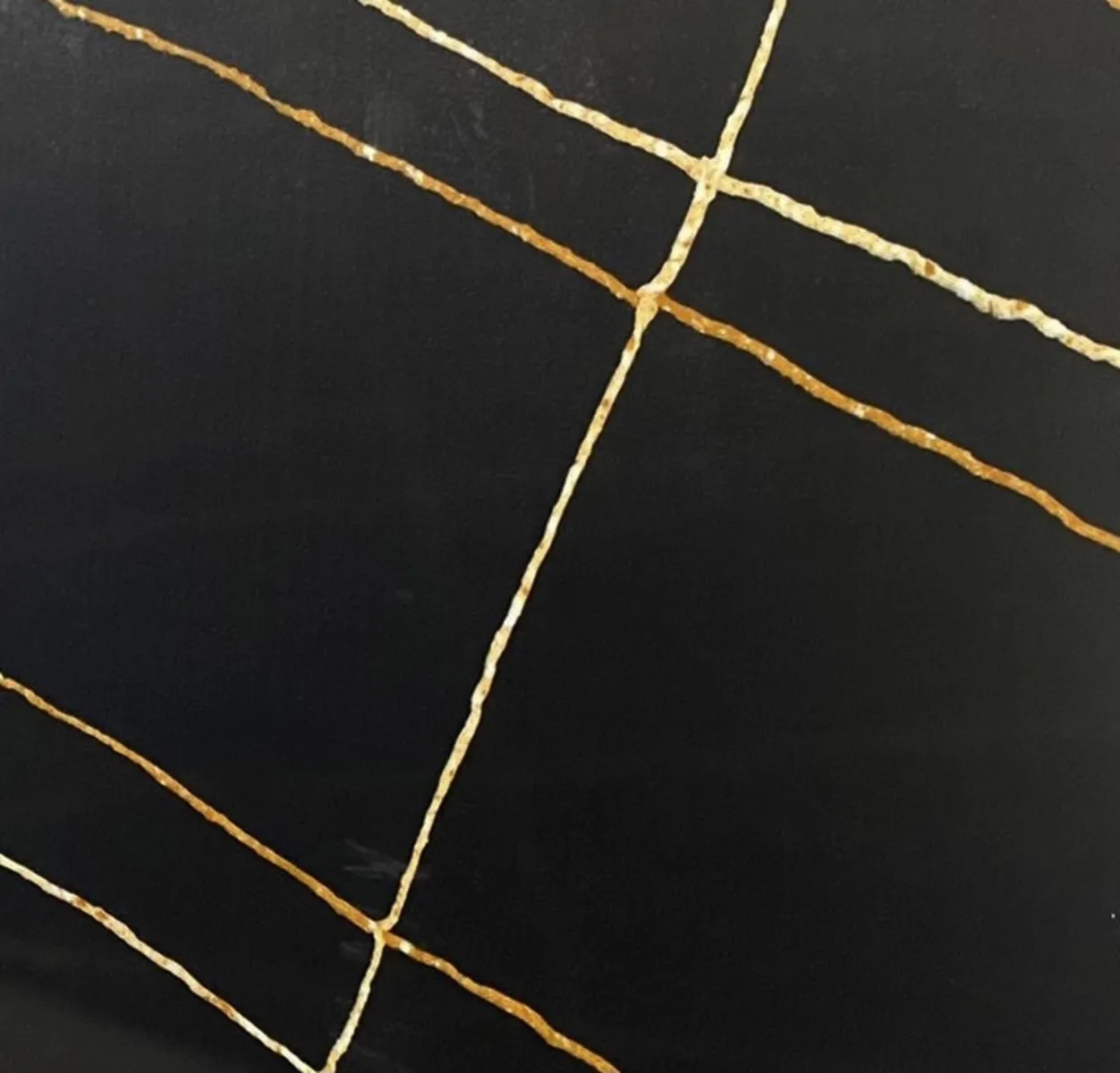 Closeup image of Opal Quartz Nero Parallel Black Quartz countertop slab