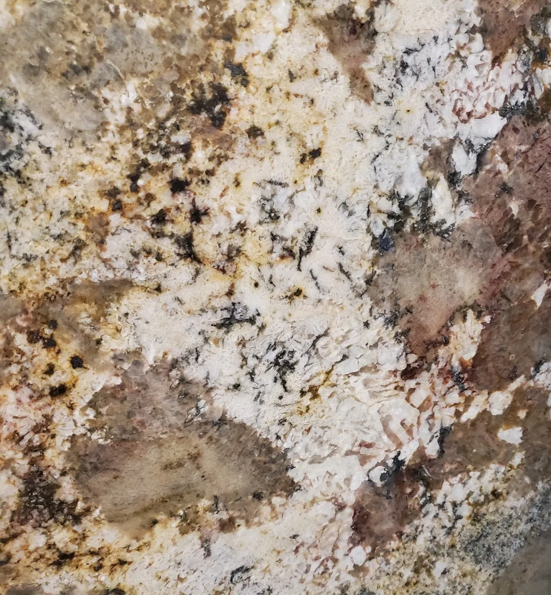 Closeup image of Pompei Brown Granite countertop slab