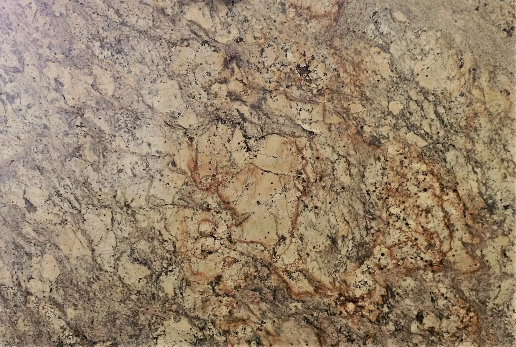 Closeup image of Revelation Beige Granite countertop slab