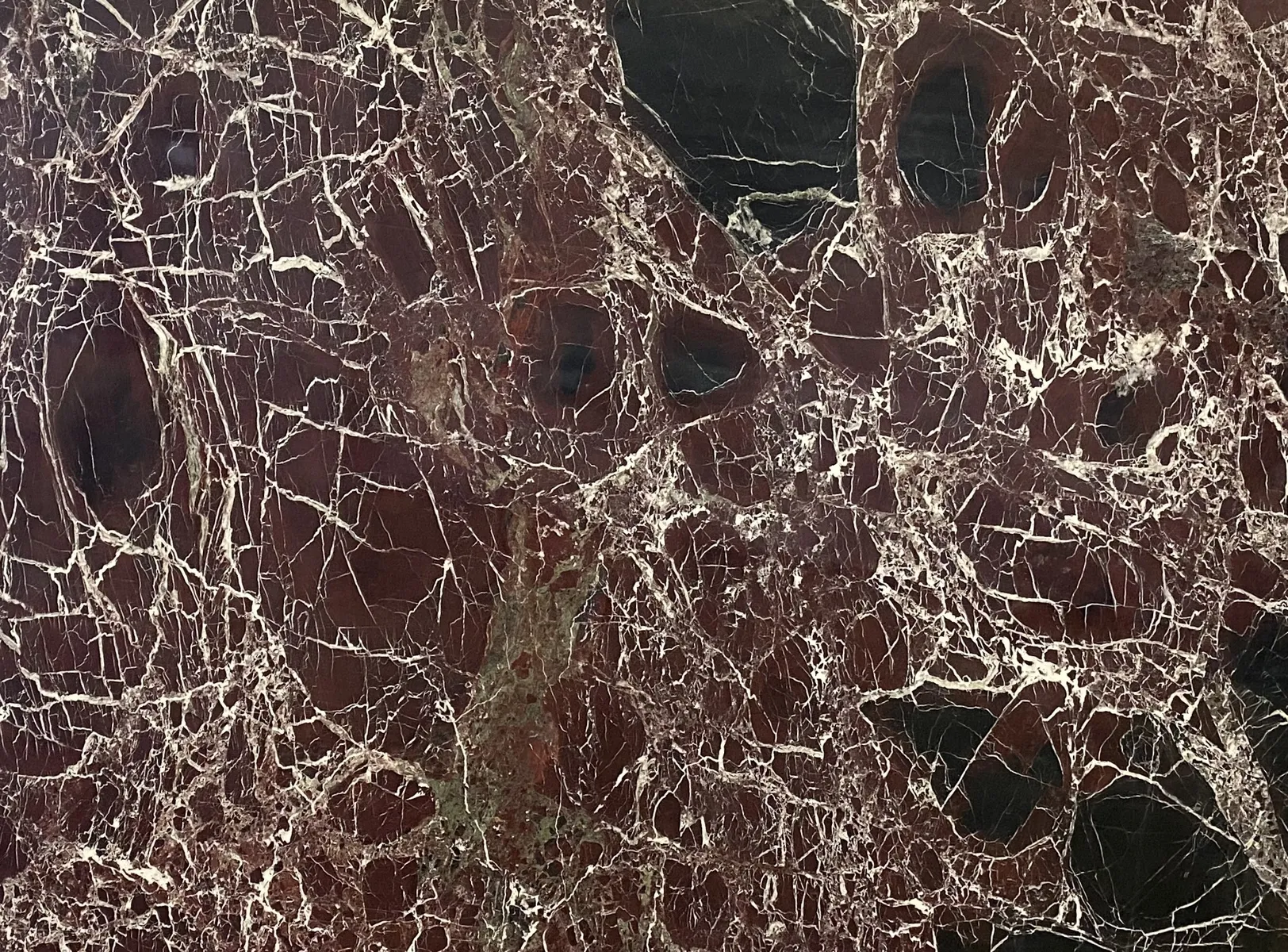 Closeup image of Roso Levanto Italiano Brown Marble countertop slab