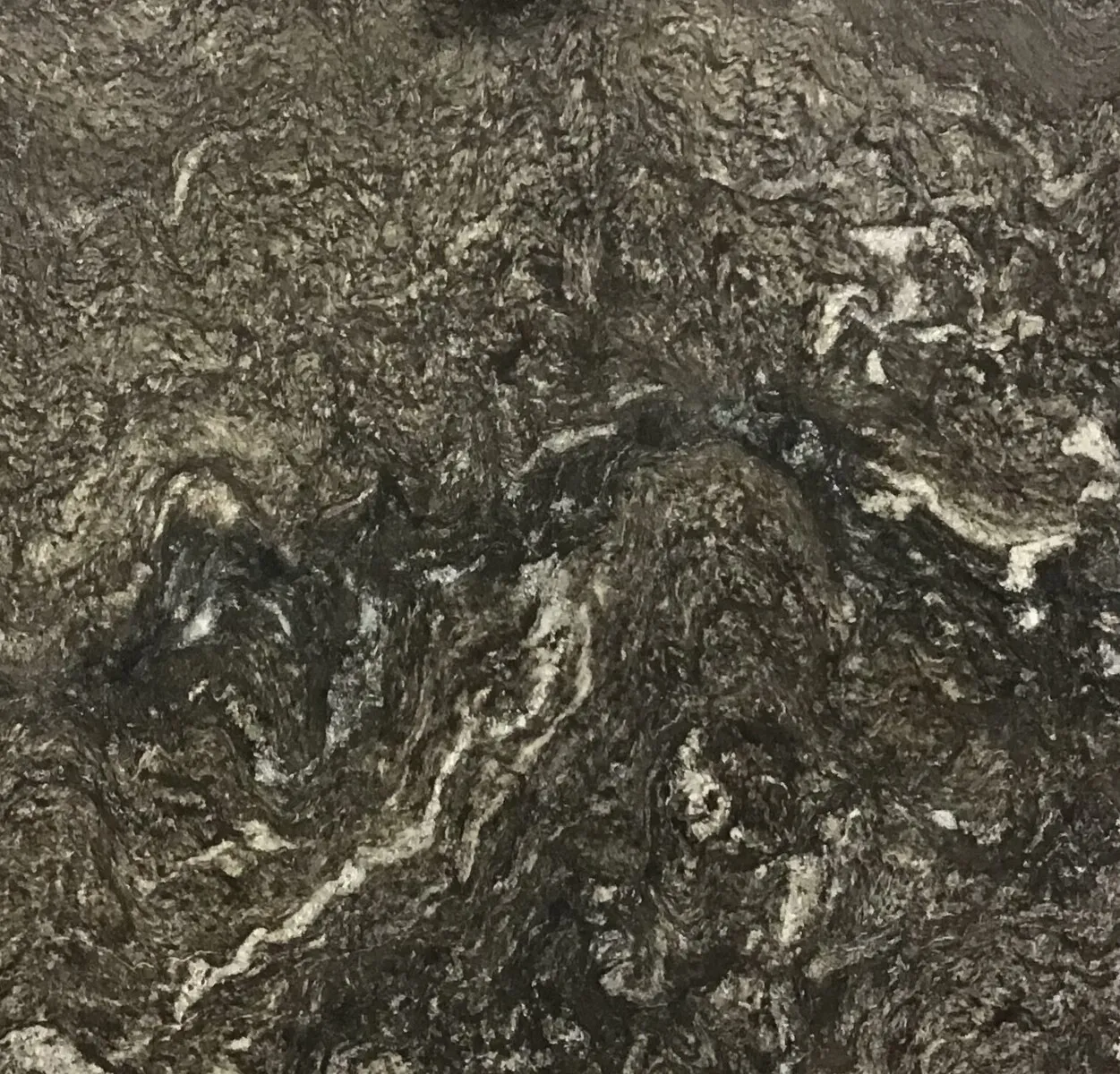 Closeup image of Santo Domingo Velvet Brown Granite countertop slab