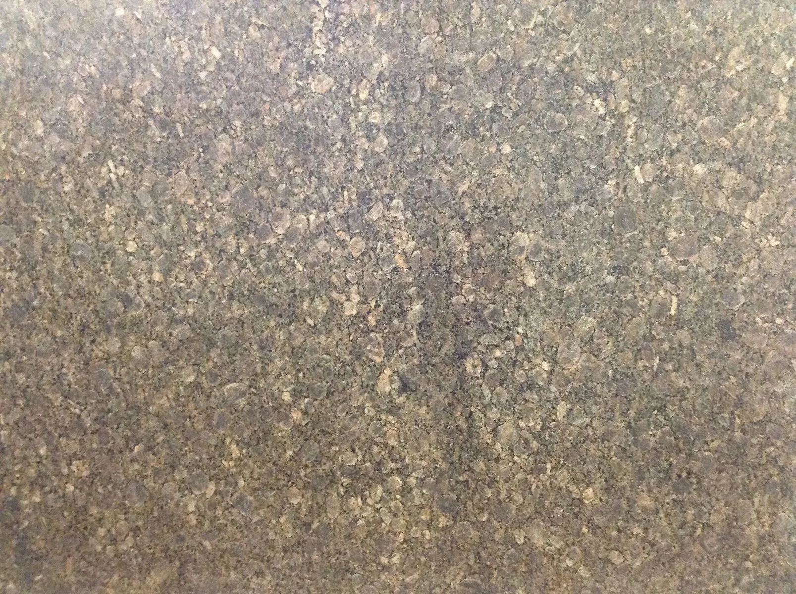 Closeup image of Sucuri Brown Granite countertop slab