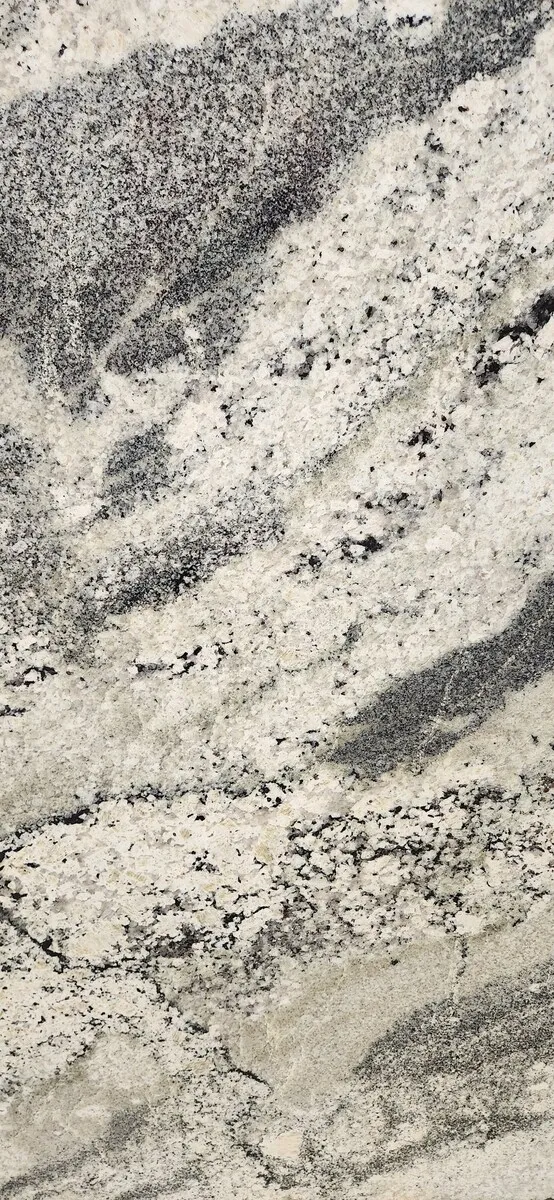 Closeup image of Vanilla White Cream Granite countertop slab