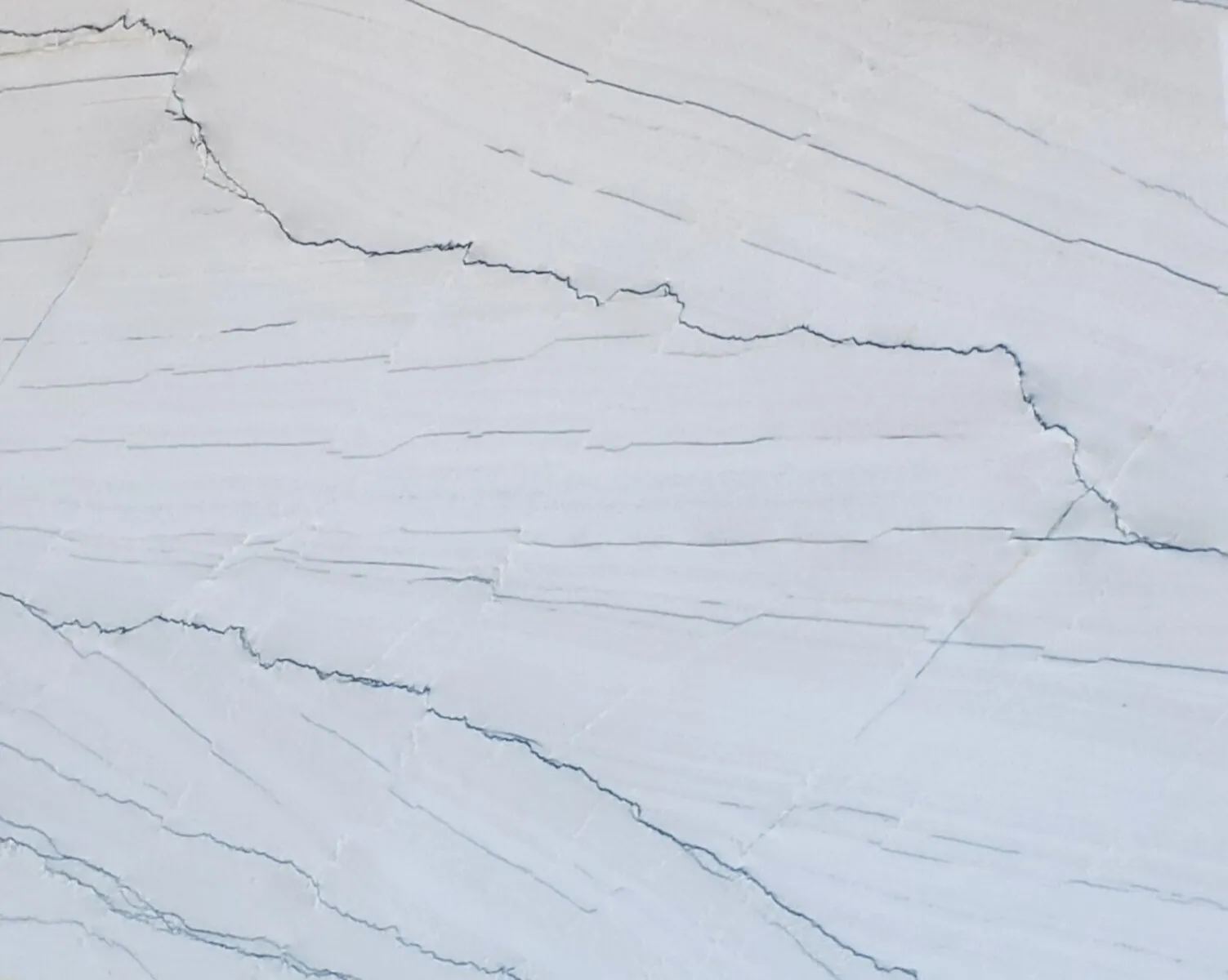 Closeup image of Yosemite Falls White Quartzite countertop slab