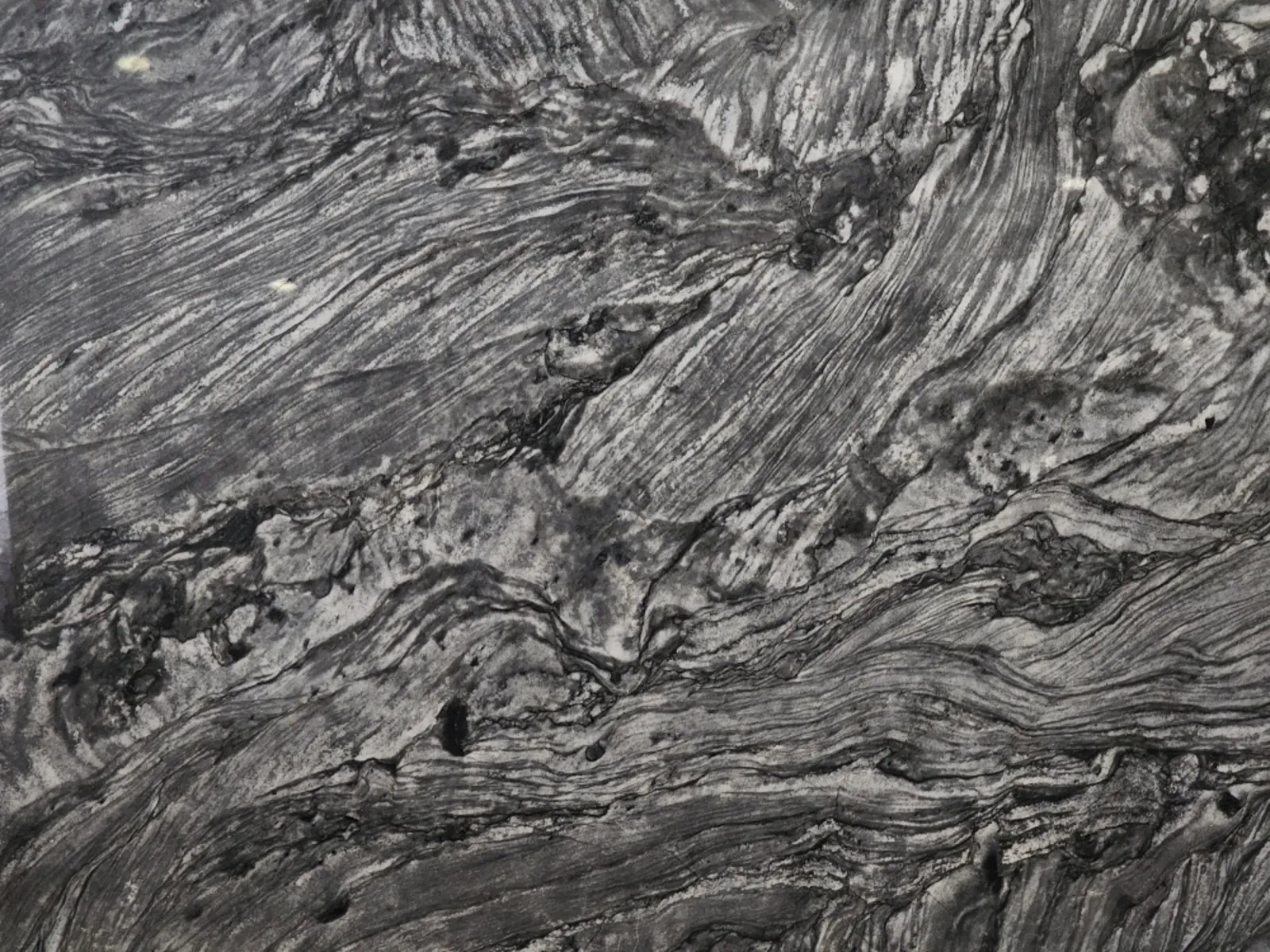 Closeup image of Adamantium Grey Quartzite countertop slab