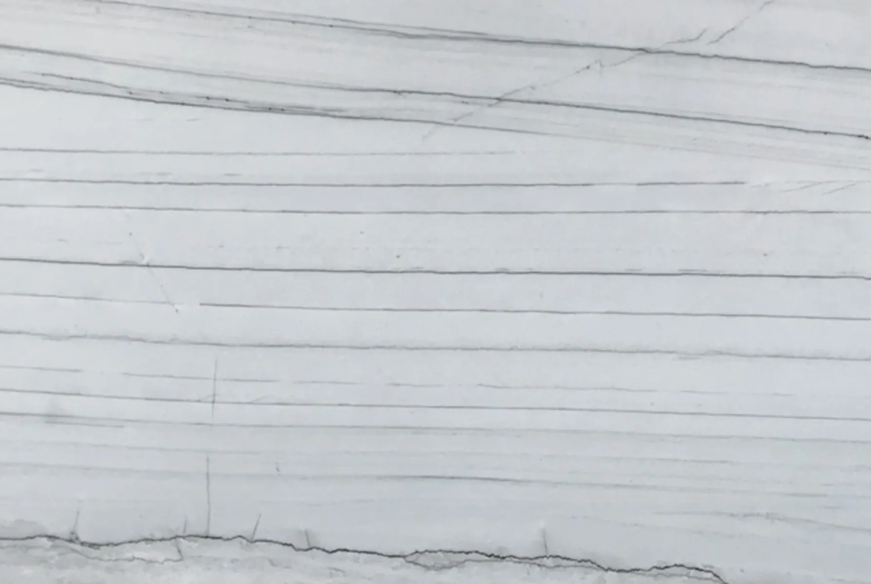 Closeup image of Bianco Supreme White Quartzite countertop slab