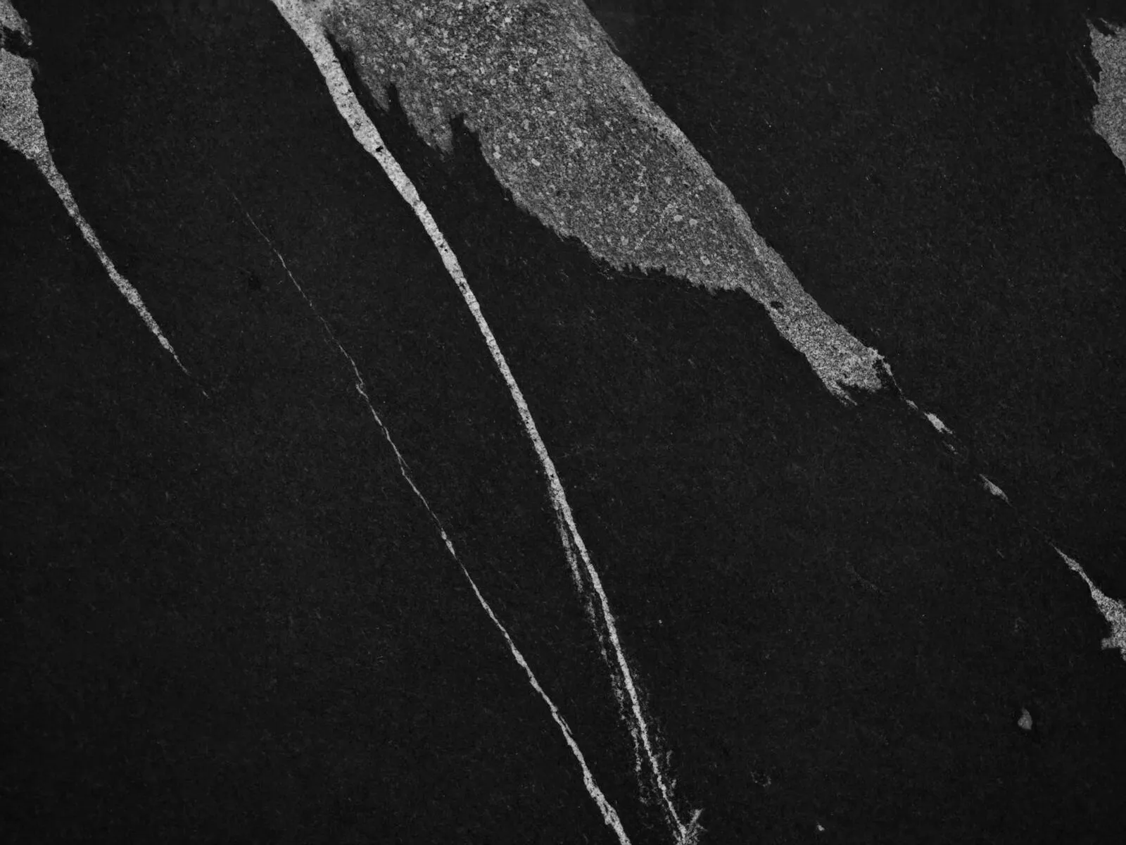 Closeup image of Black Mamba Black Granite countertop slab
